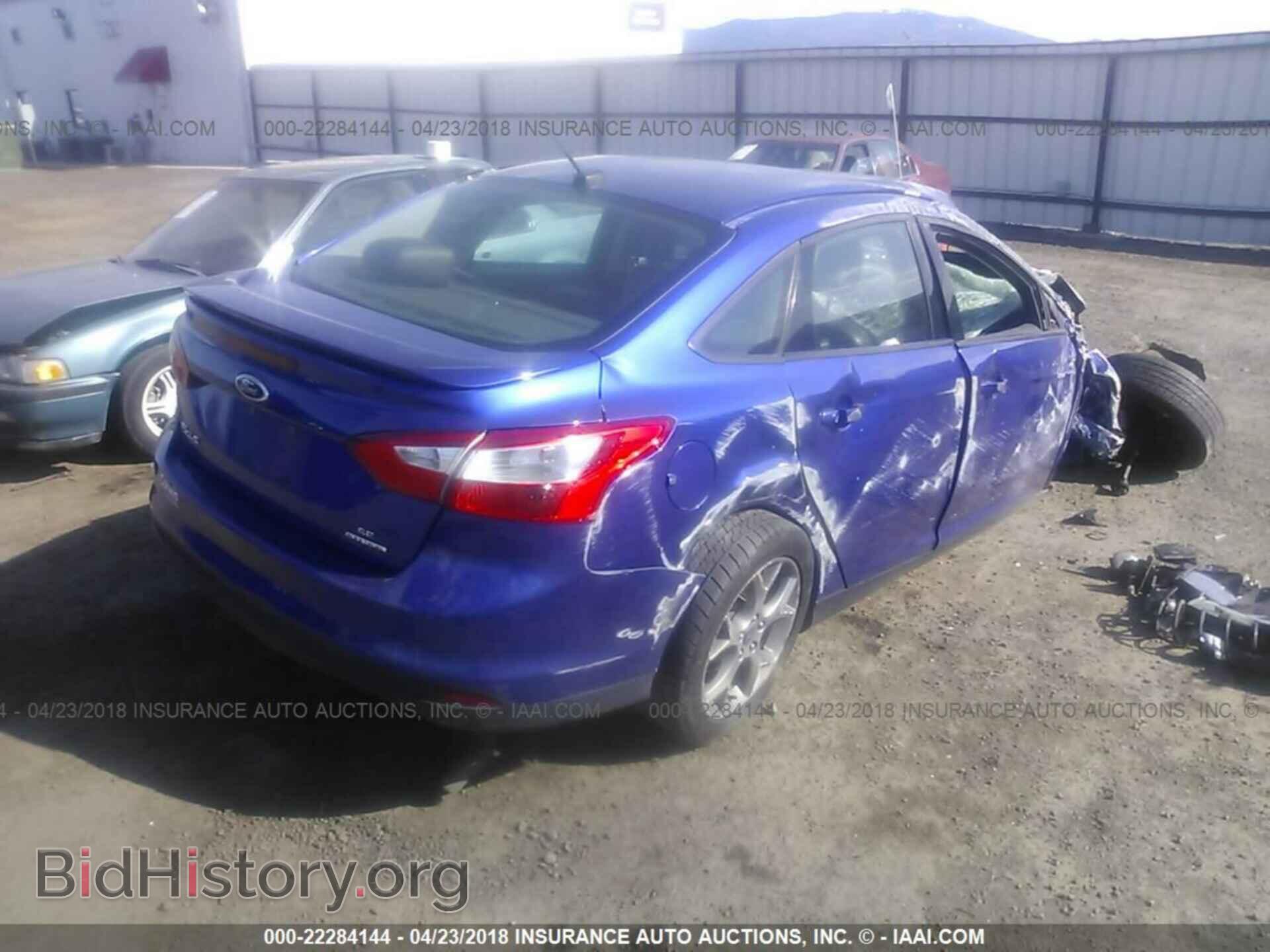 2014 Ford Focus - VIN: 1FADP3F28EL433648 - Photo 4