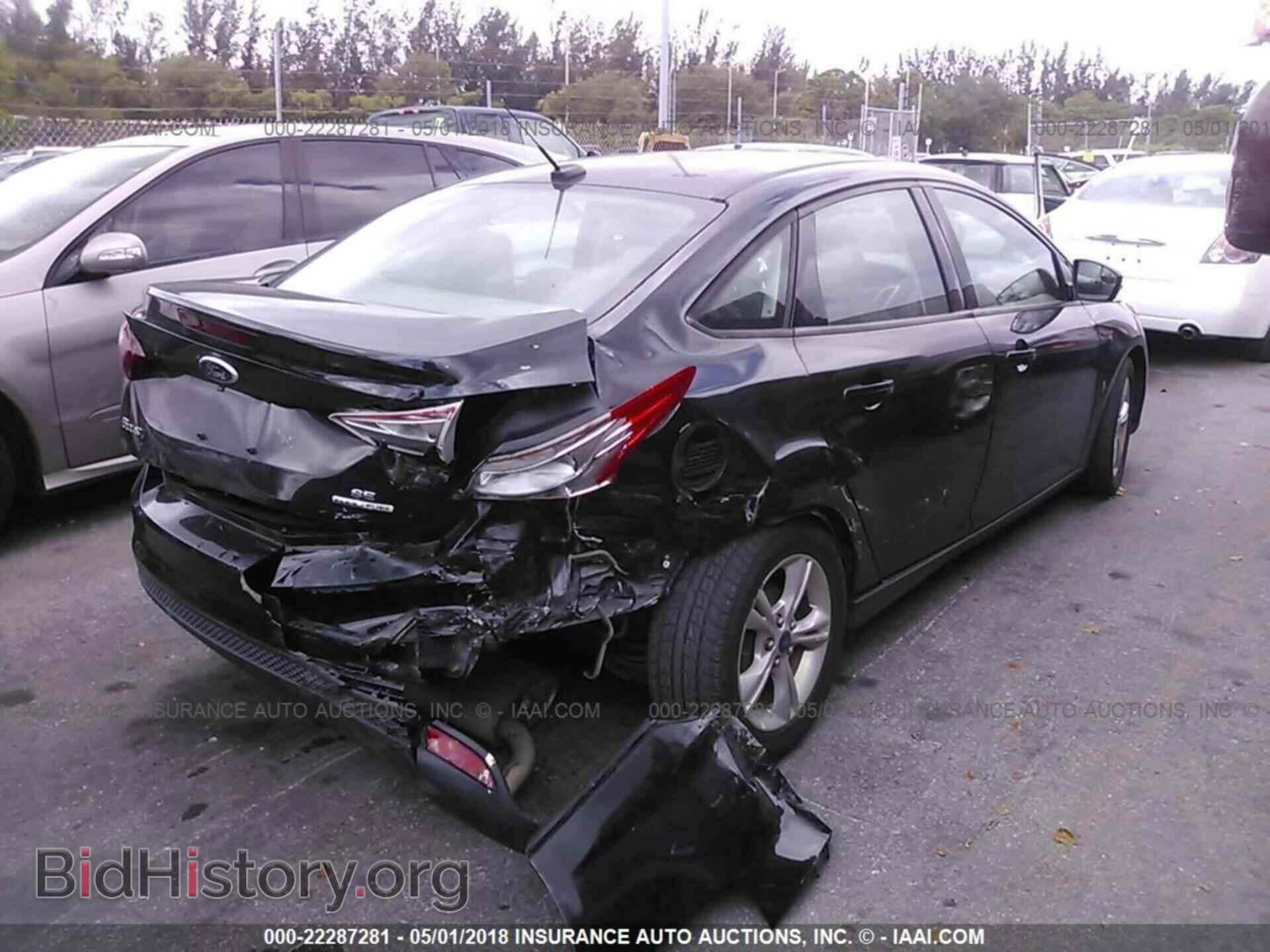 2014 Ford Focus - VIN: 1FADP3F2XEL277192 - Photo 4
