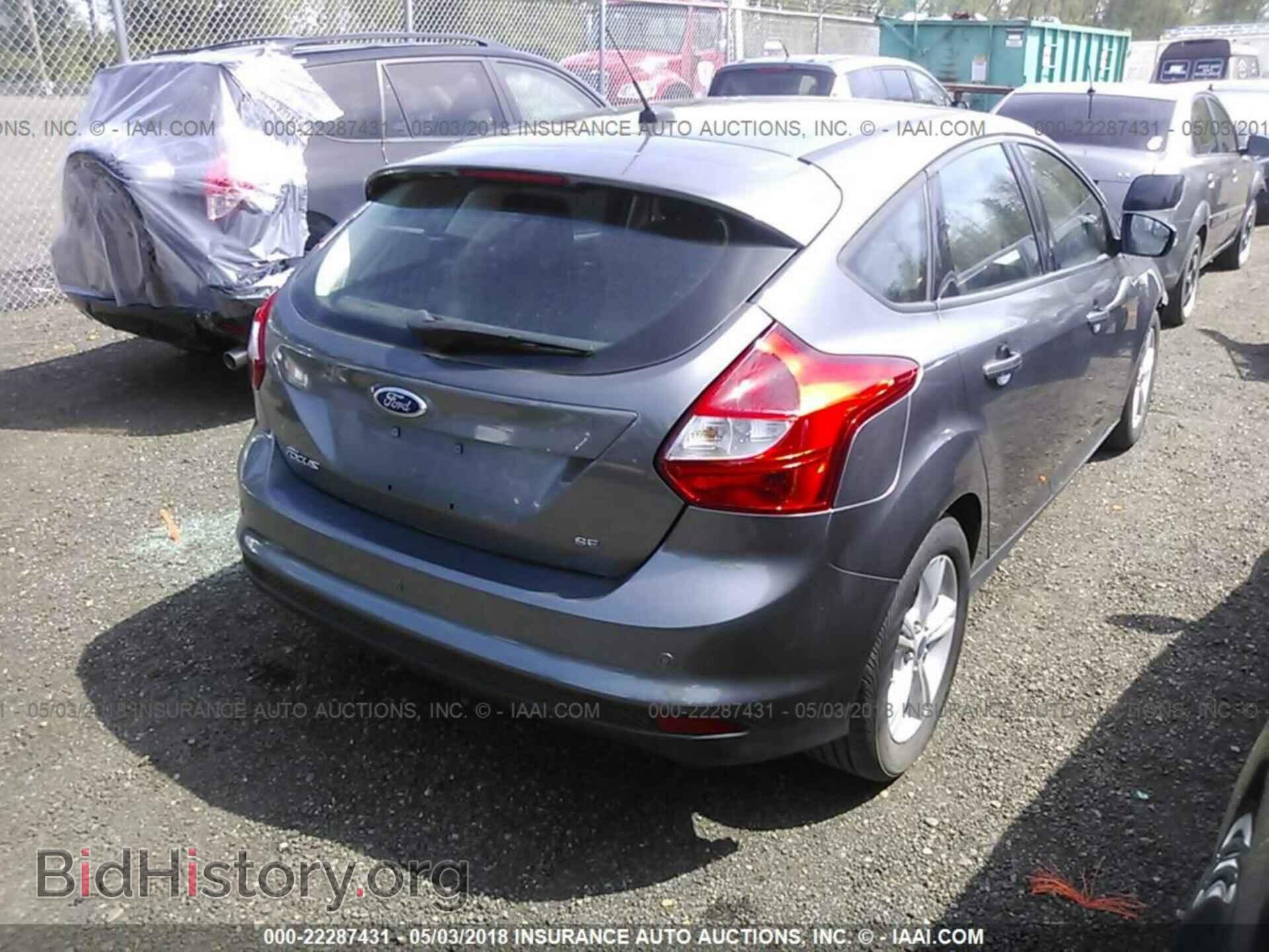 2014 Ford Focus - VIN: 1FADP3K22EL414339 - Photo 4