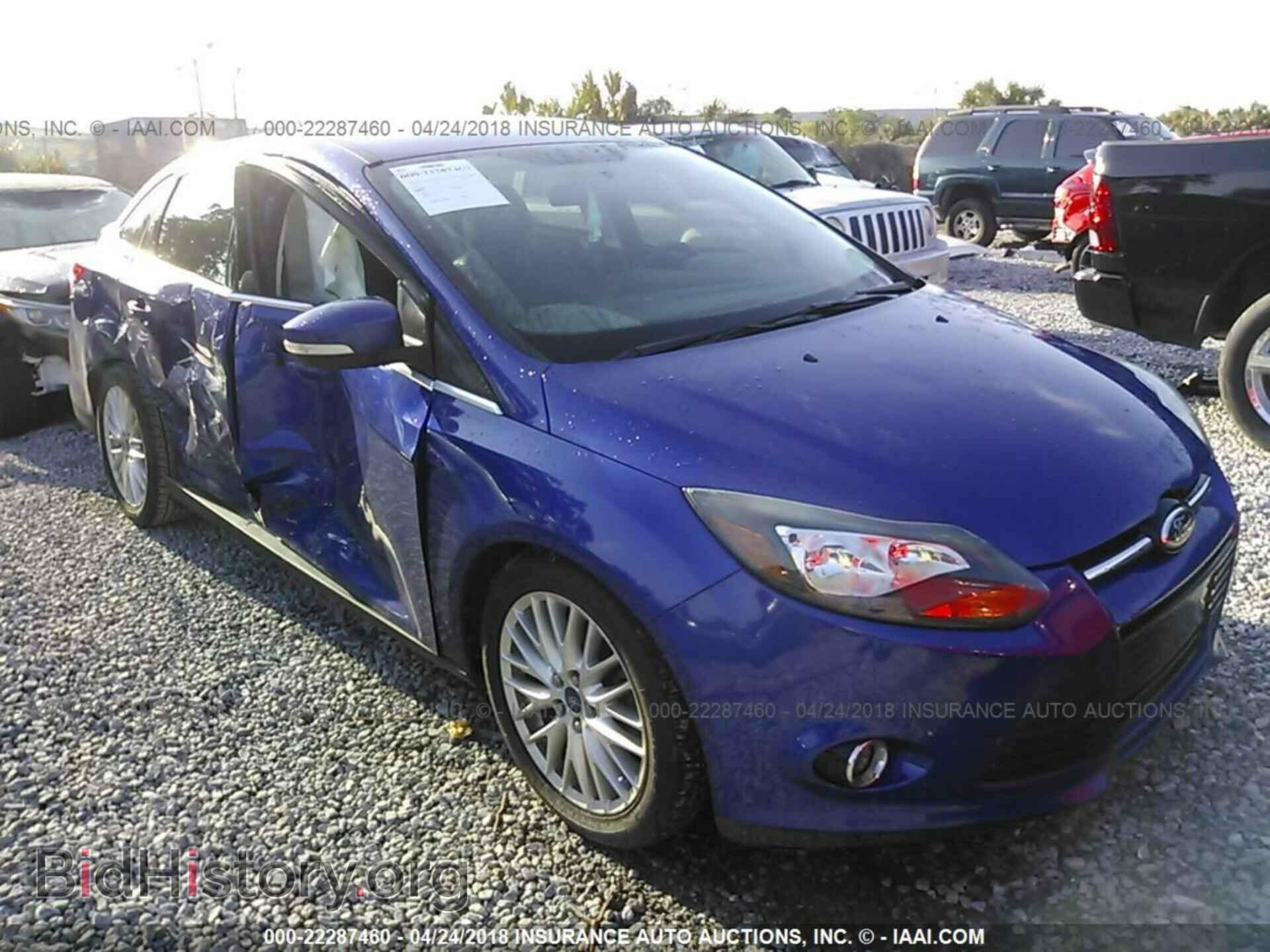 Фотография 1FADP3J25EL104168 - Ford Focus 2014