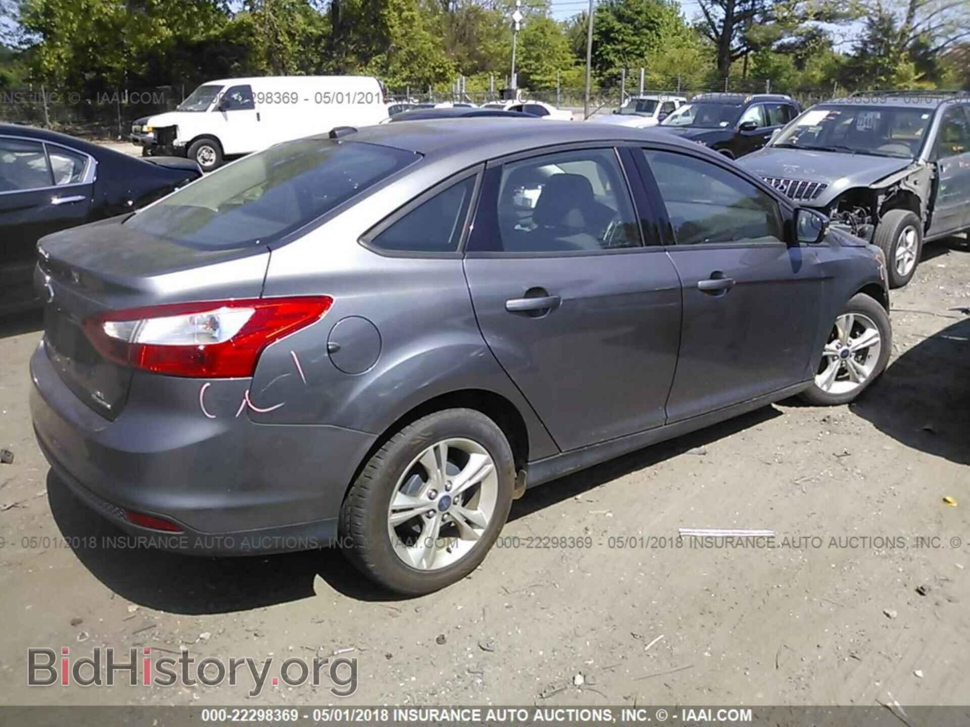 2014 Ford Focus - VIN: 1FADP3F28EL243655 - Photo 4