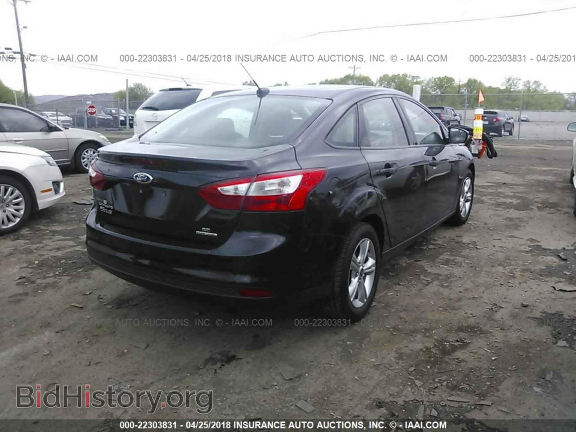 2013 Ford Focus - VIN: 1FADP3F25DL285537 - Photo 4