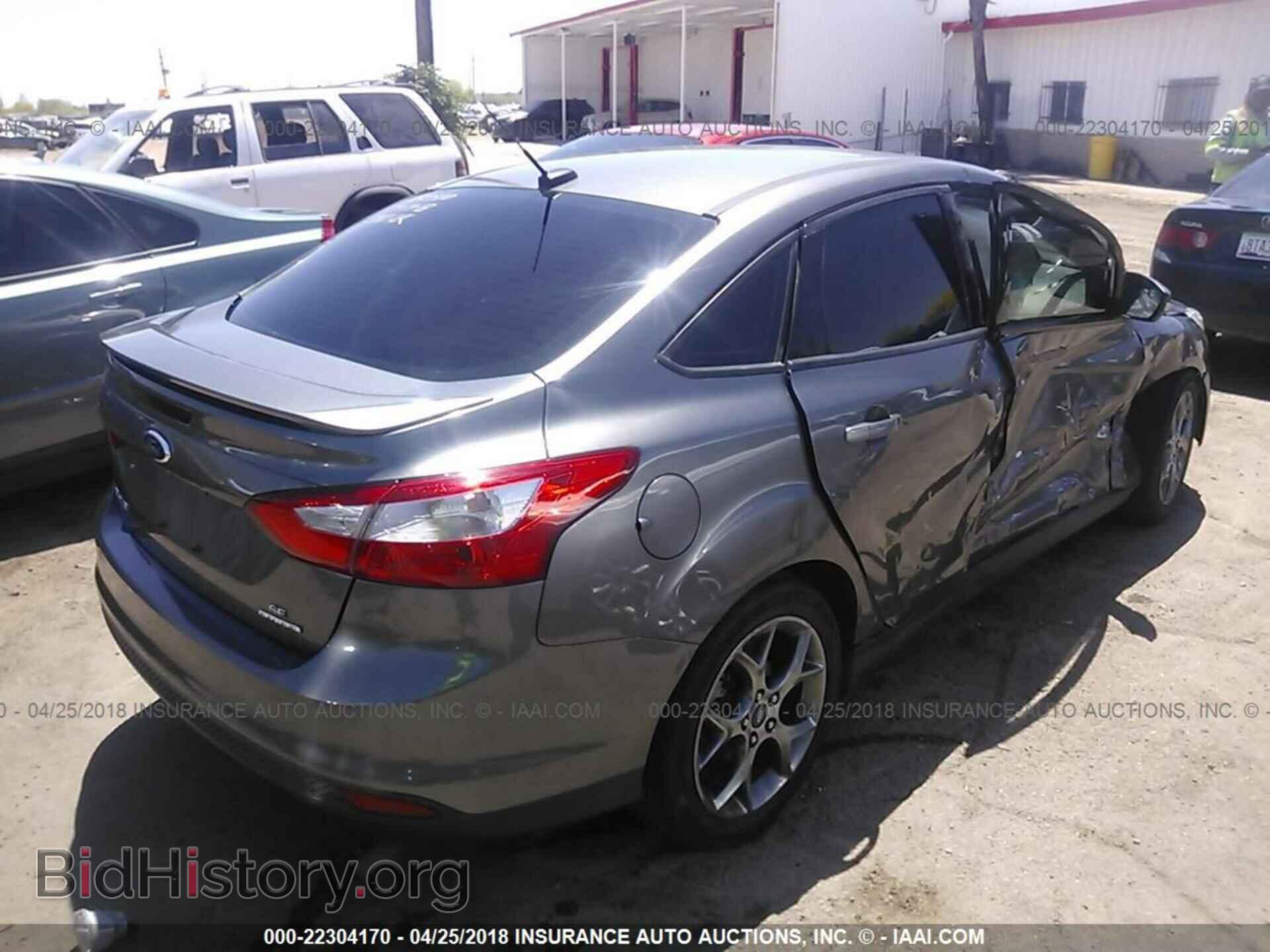 2014 Ford Focus - VIN: 1FADP3F2XEL151219 - Photo 4