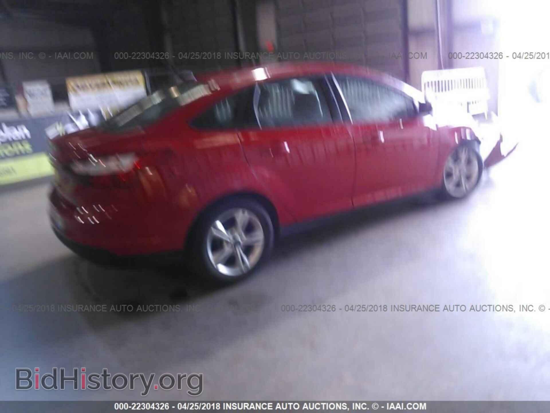2014 Ford Focus - VIN: 1FADP3F26EL191037 - Photo 4
