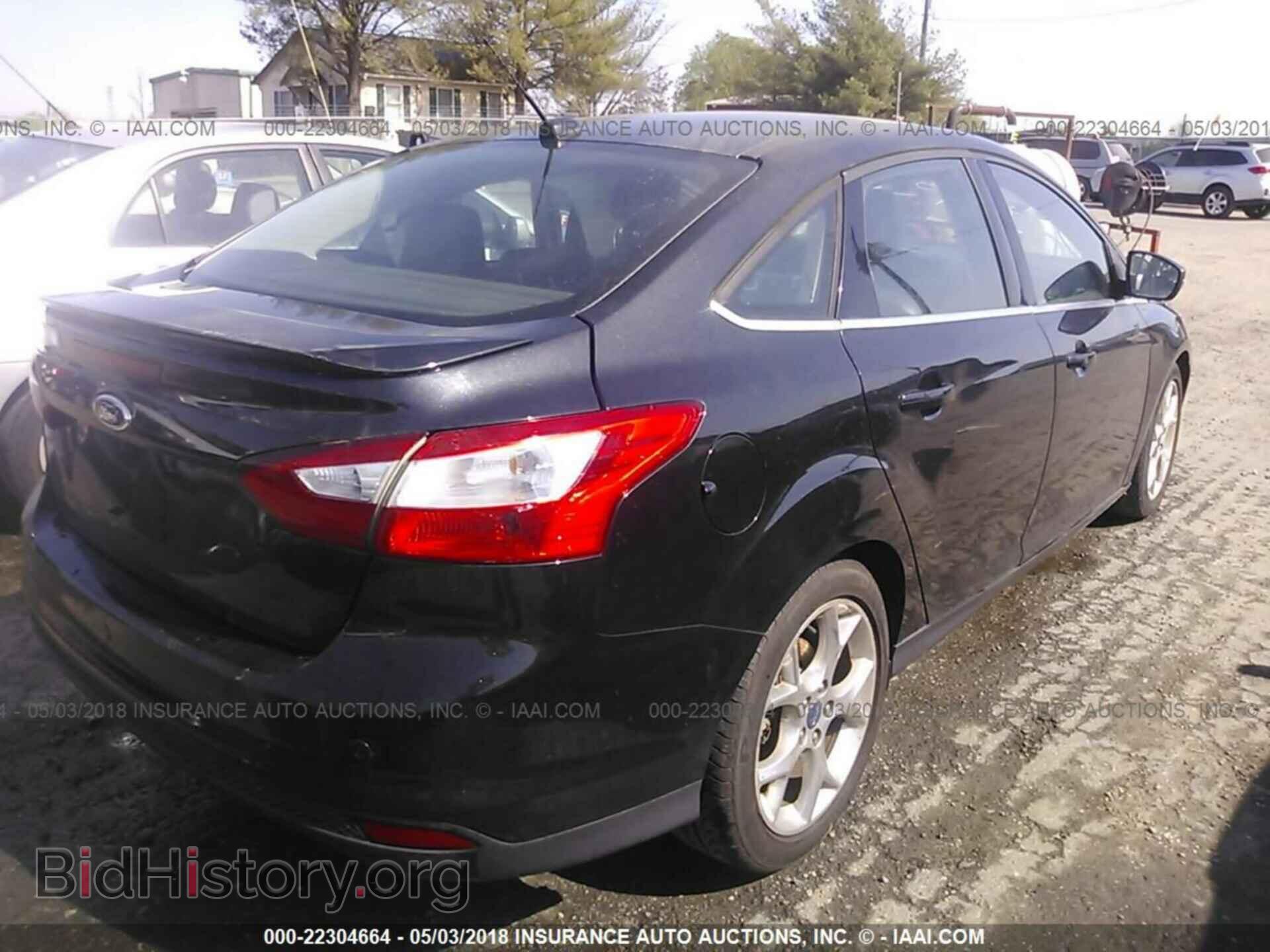 2012 Ford Focus - VIN: 1FAHP3J22CL104000 - Photo 4