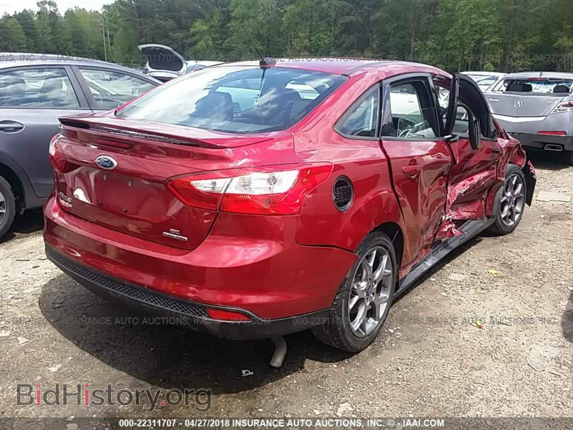 2014 Ford Focus - VIN: 1FADP3F27EL190575 - Photo 4