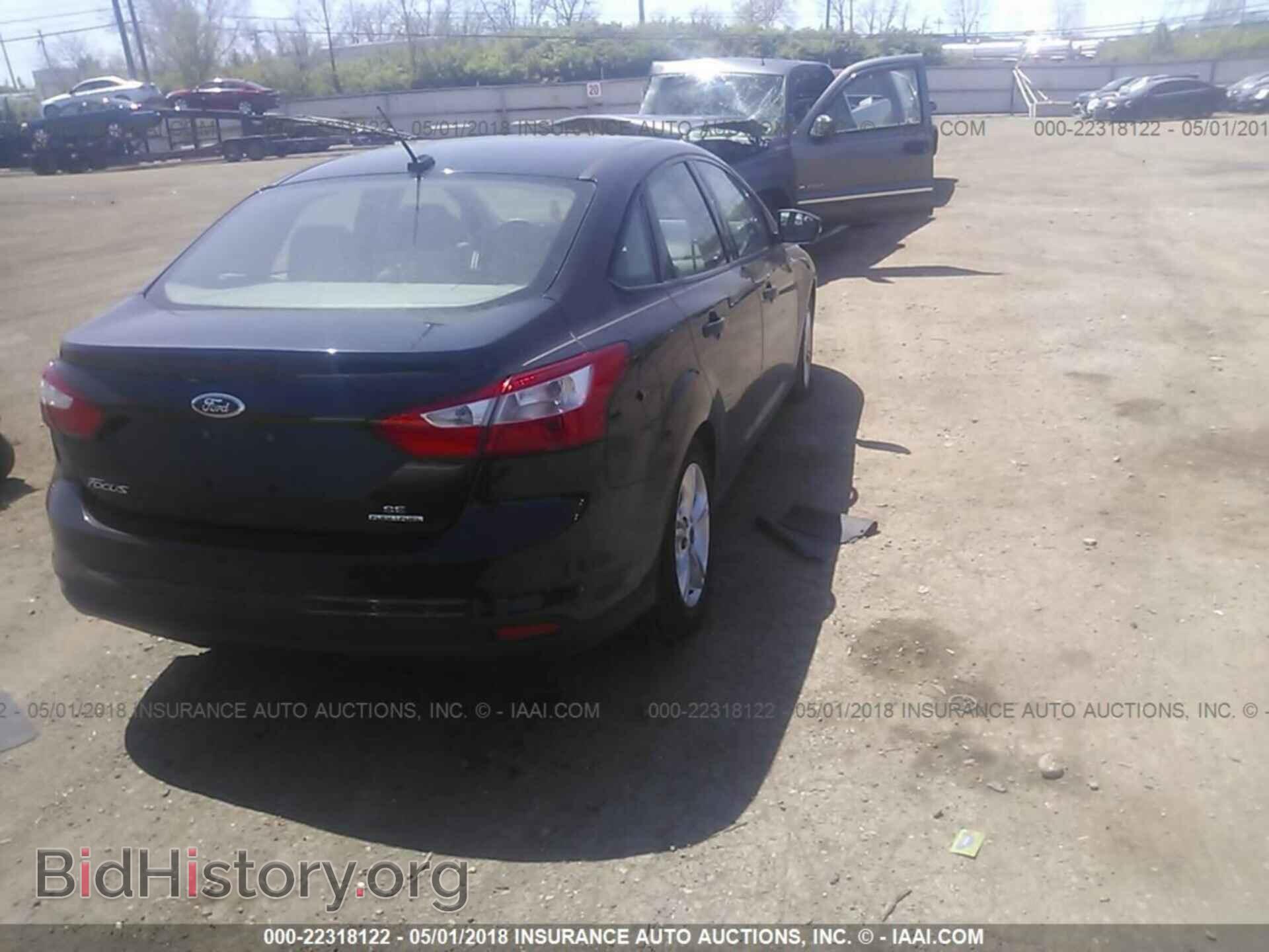 2014 Ford Focus - VIN: 1FADP3F26EL161018 - Фото 4