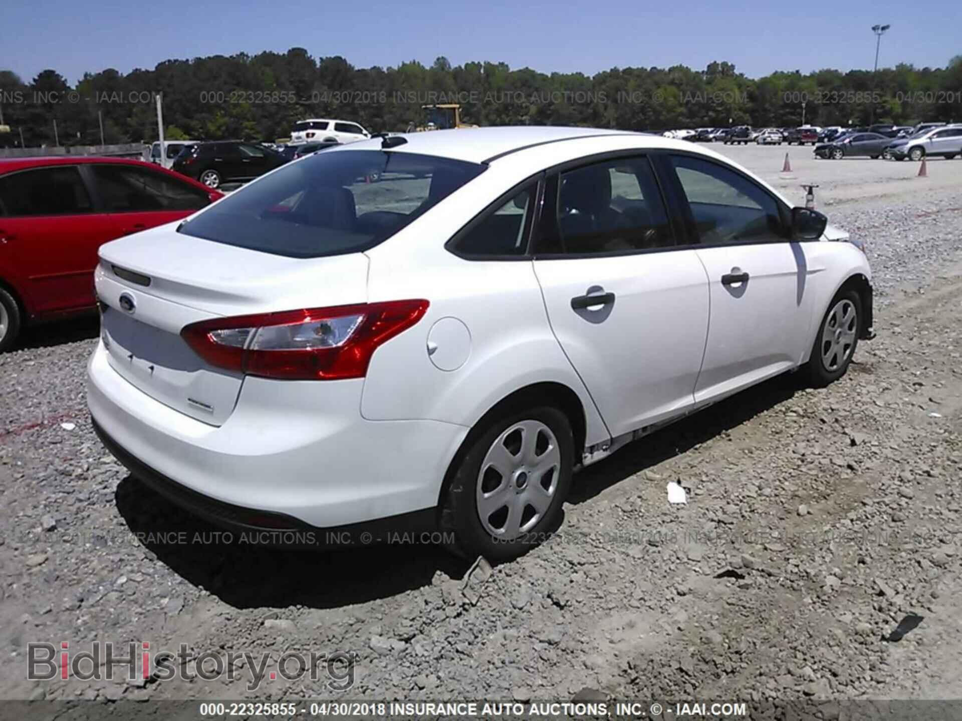 2014 Ford Focus - VIN: 1FADP3E21EL120054 - Photo 4