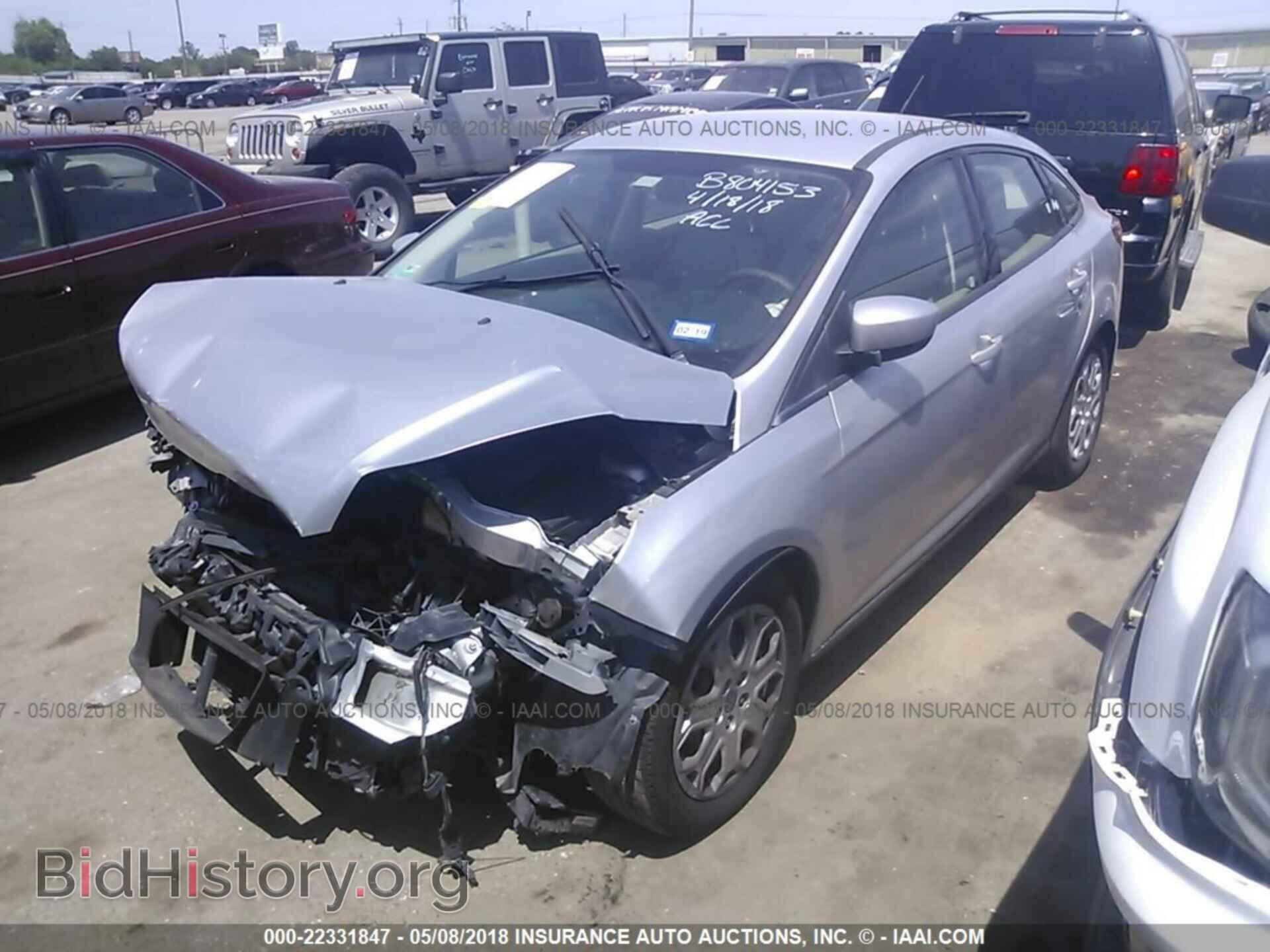 2012 Ford Focus - VIN: 1FAHP3F26CL323938 - Photo 2
