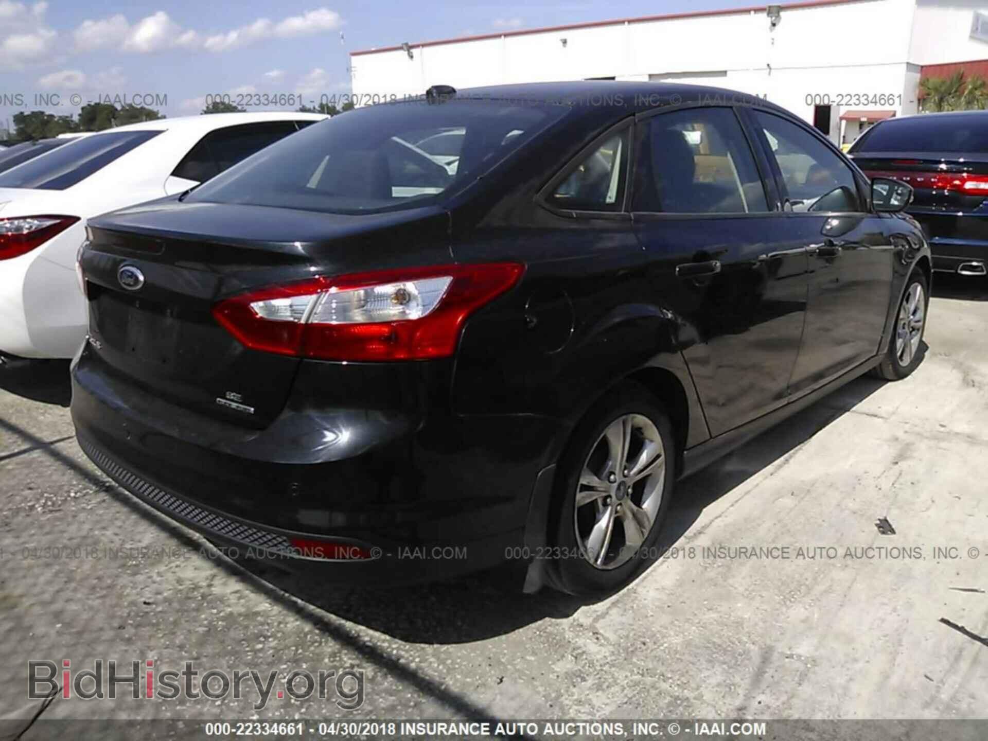 2014 Ford Focus - VIN: 1FADP3F29EL225634 - Фото 4