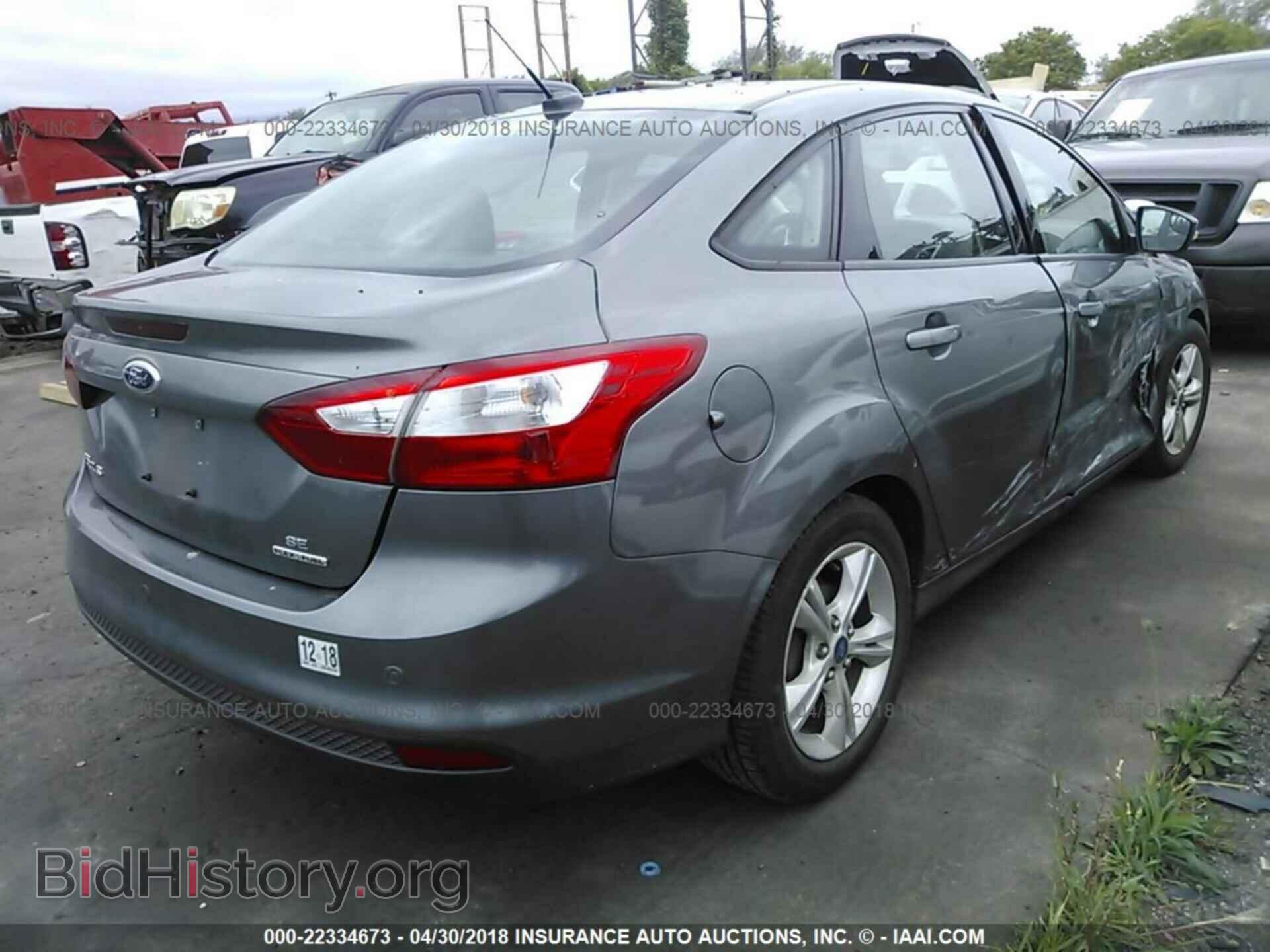 2014 Ford Focus - VIN: 1FADP3F28EL224989 - Photo 4