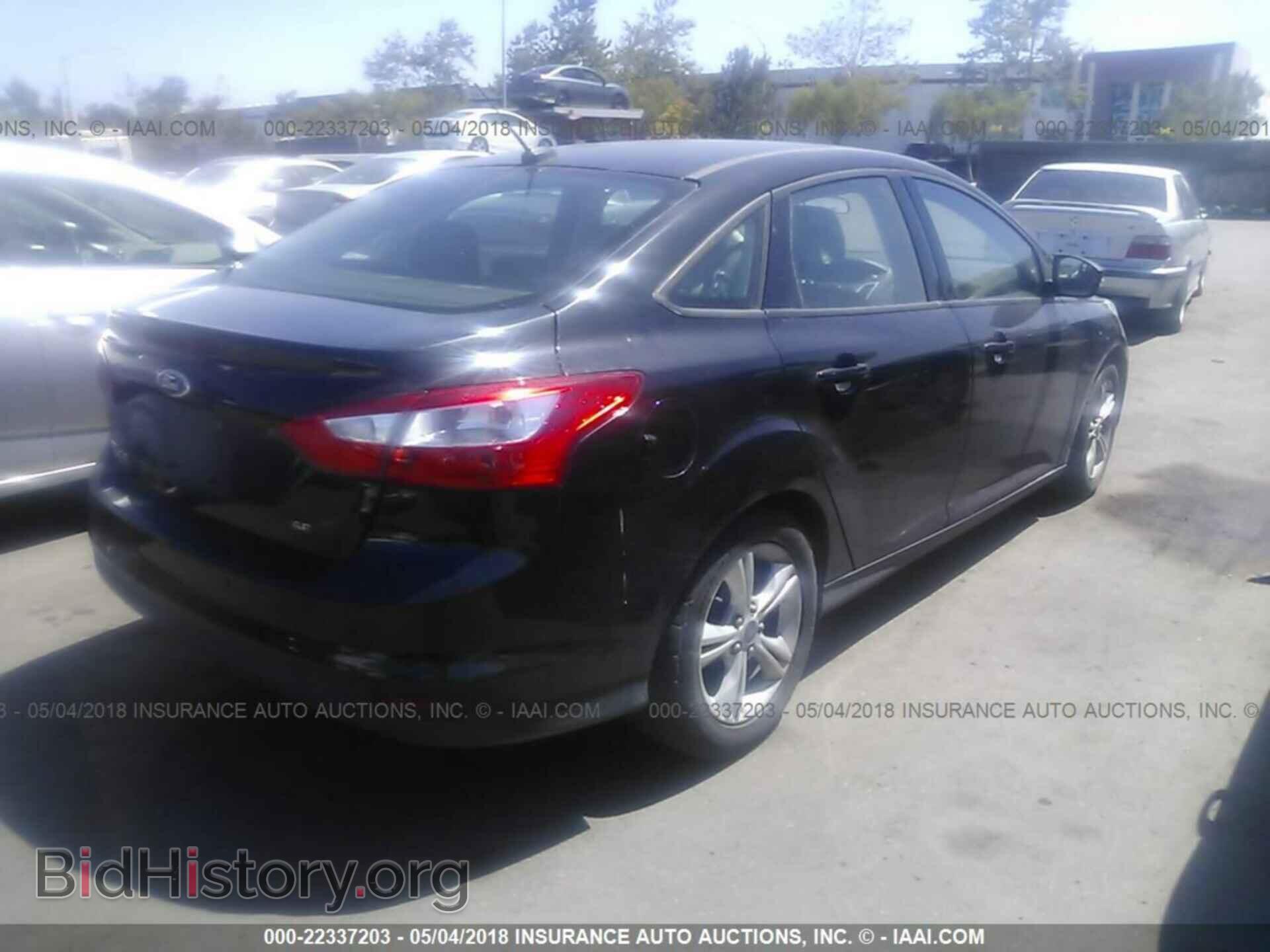 2014 Ford Focus - VIN: 1FADP3F21EL213655 - Photo 4