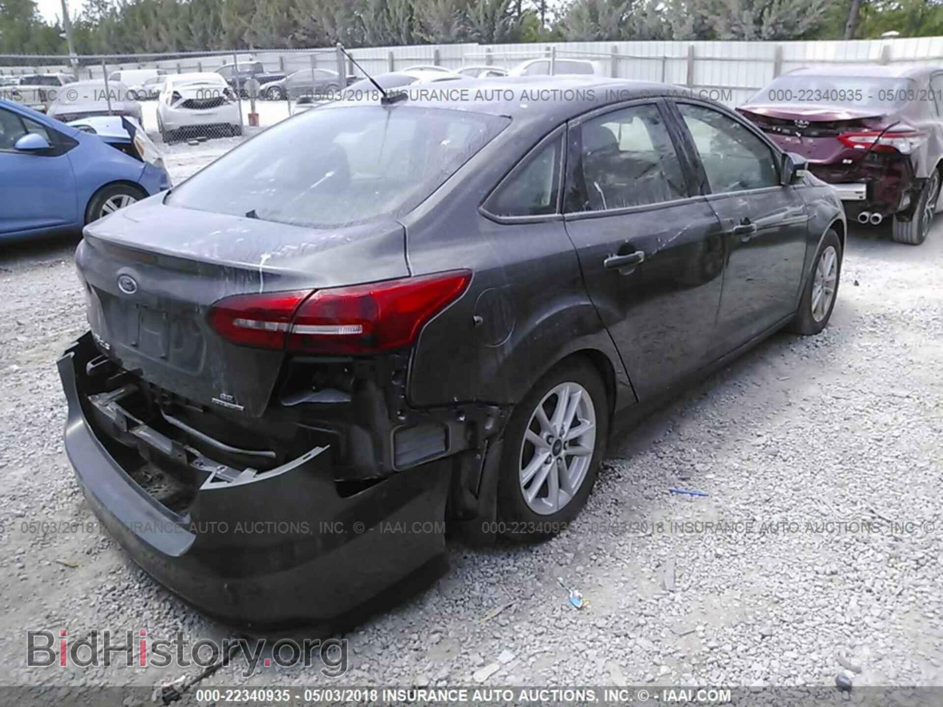 2016 Ford Focus - VIN: 1FADP3F21GL262633 - Фото 4