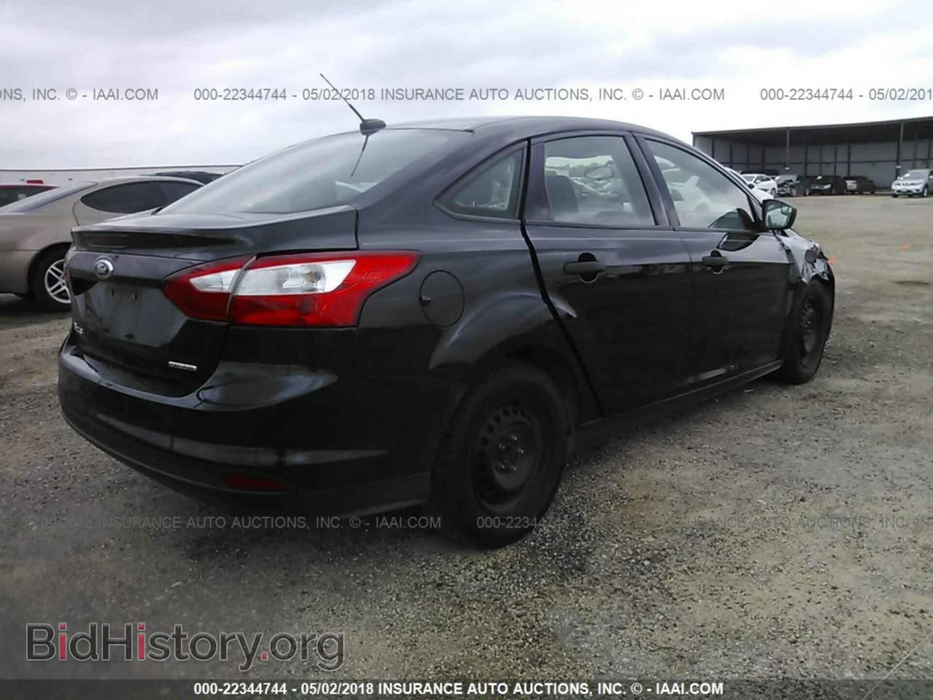 2014 Ford Focus - VIN: 1FADP3E23EL229311 - Фото 4