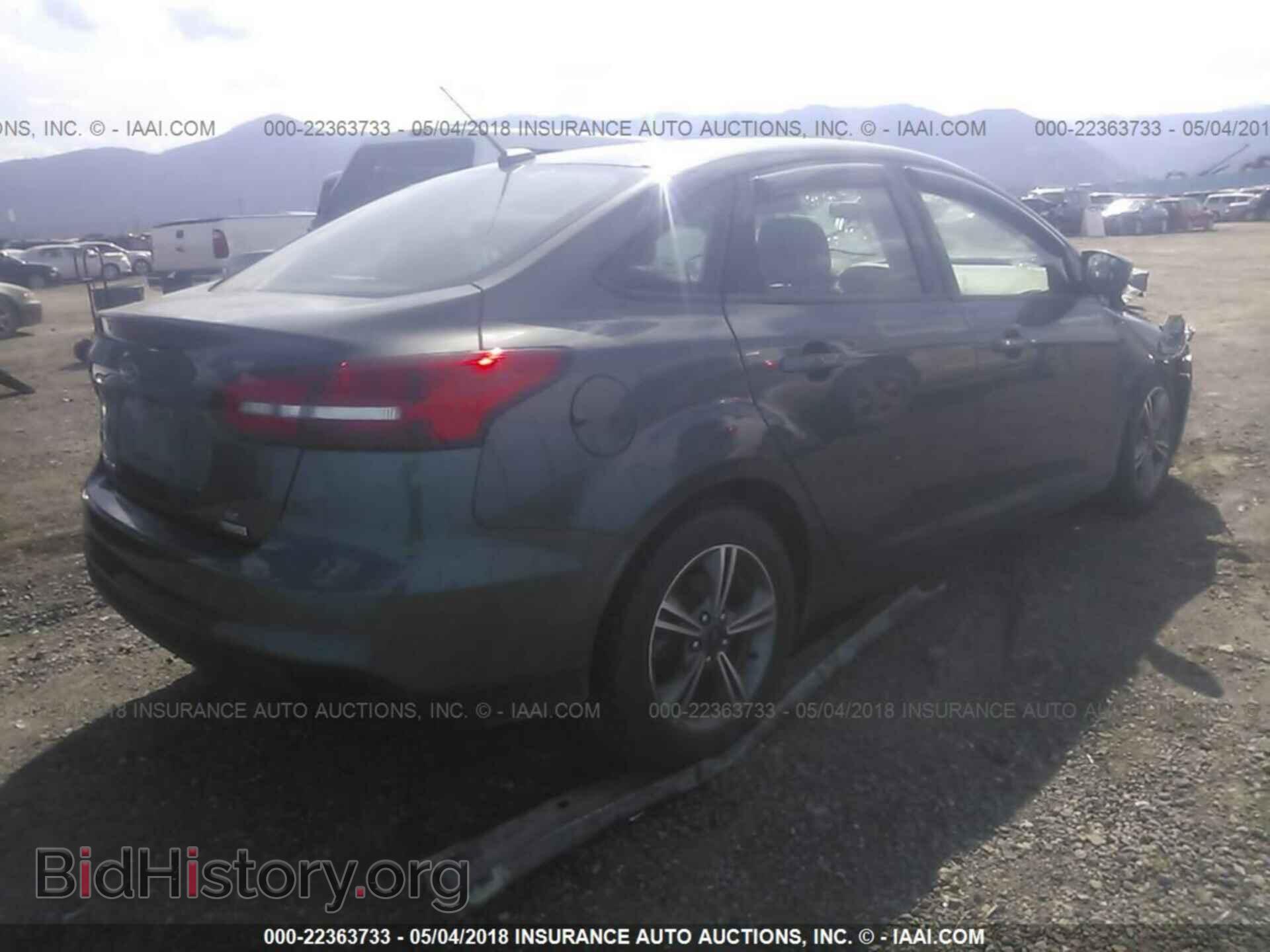 2017 Ford Focus - VIN: 1FADP3FE8HL304226 - Photo 4