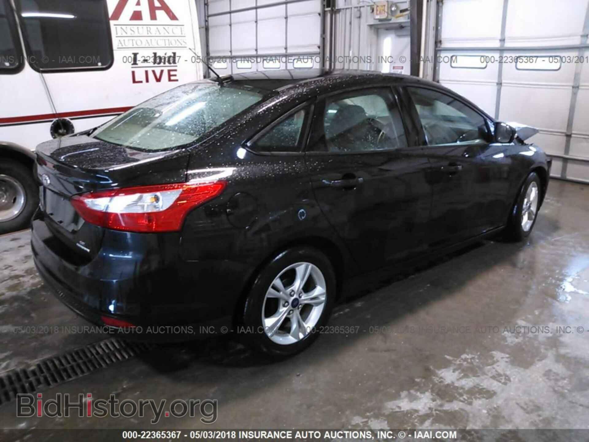 2014 Ford Focus - VIN: 1FADP3F24EL270819 - Фото 4