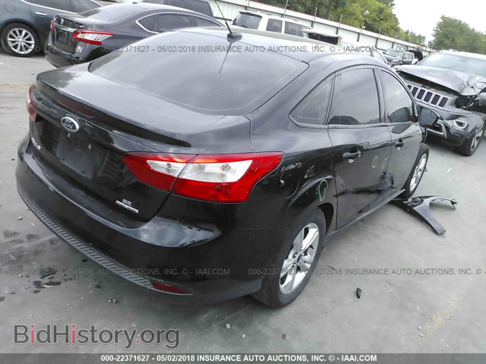 2014 Ford Focus - VIN: 1FADP3F23EL286557 - Photo 4
