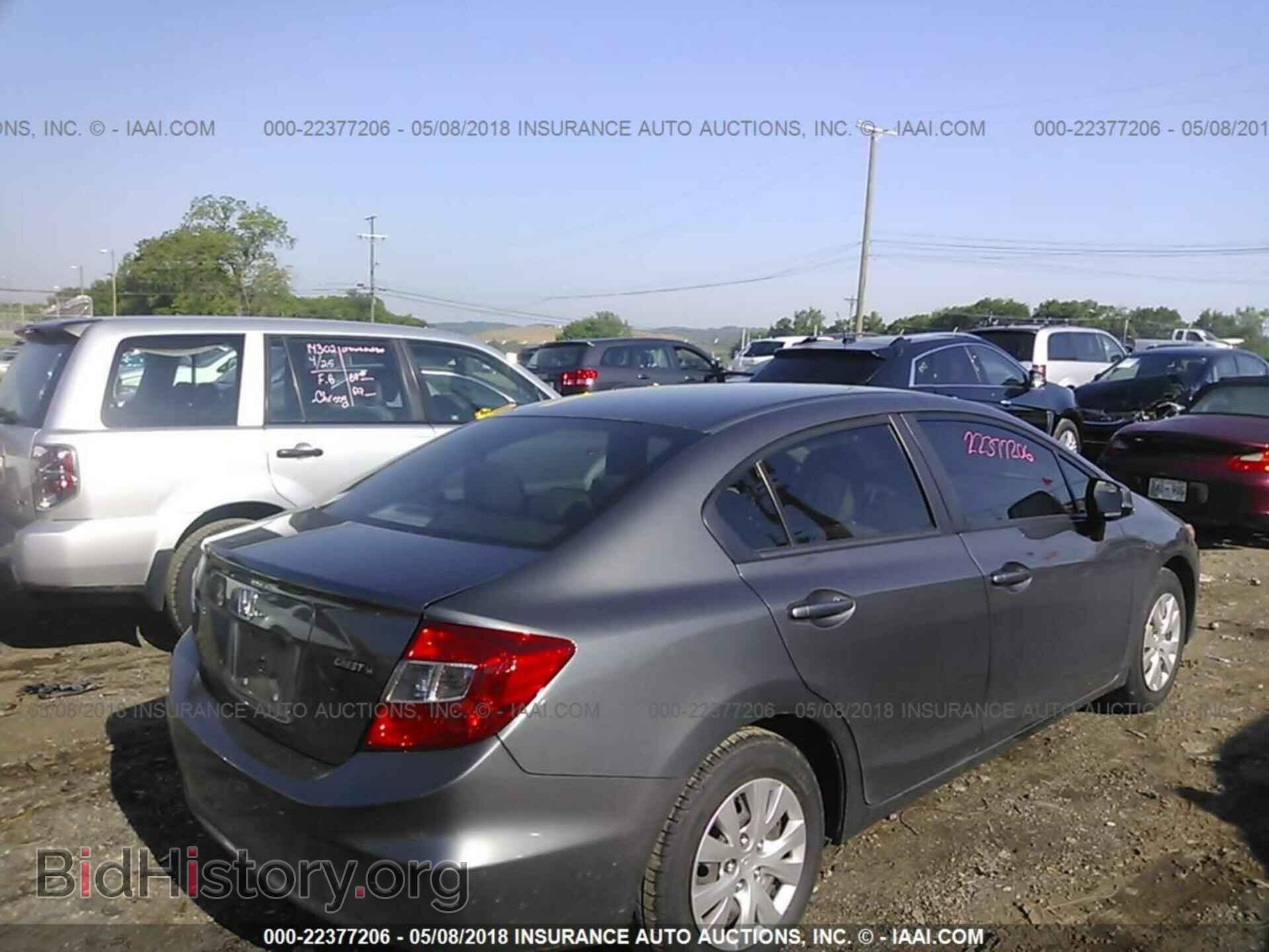 2012 Honda CIVIC (VIN 2HGFB2F57CH515209) — photo 4 of 10