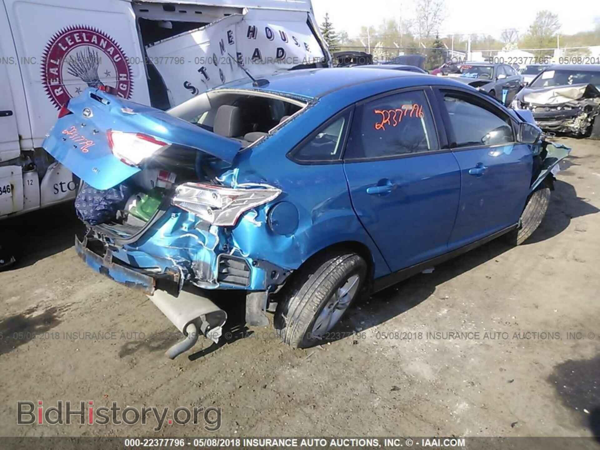 2014 Ford Focus - VIN: 1FADP3F28EL235071 - Фото 4