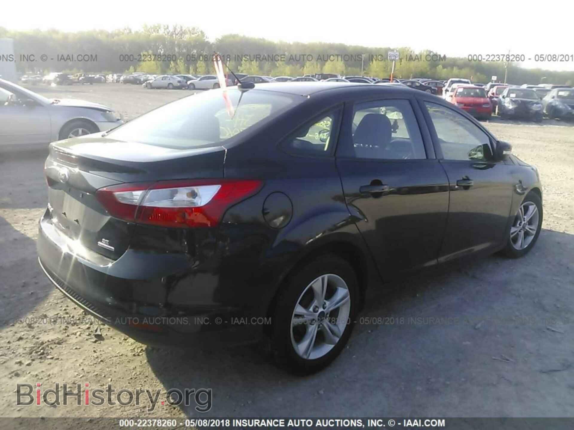 2014 Ford Focus - VIN: 1FADP3F23EL347440 - Фото 4