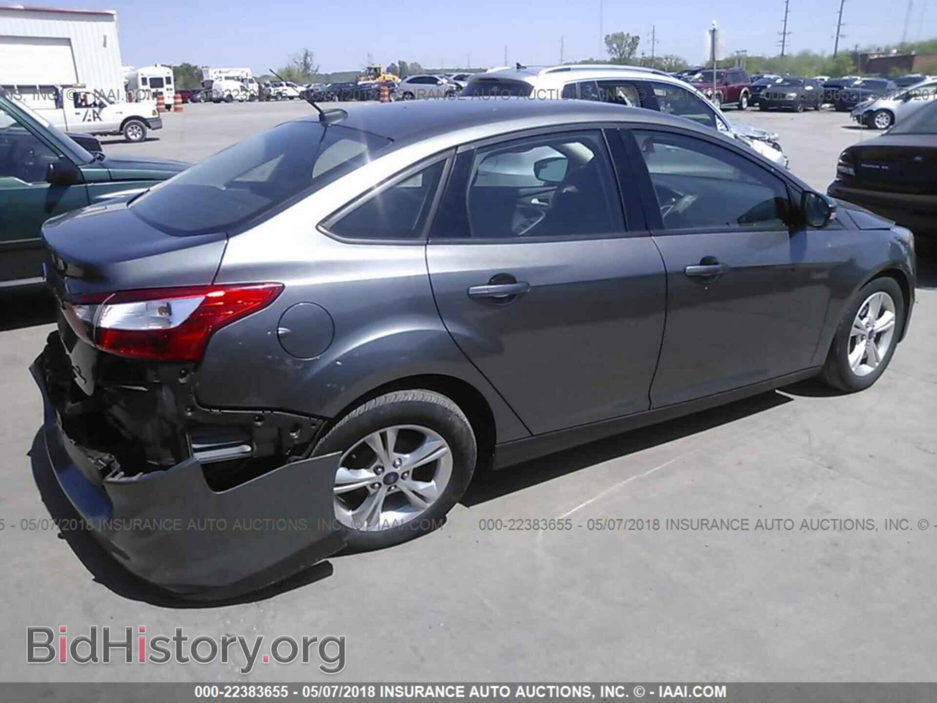 2014 Ford Focus - VIN: 1FADP3F27EL256140 - Photo 4