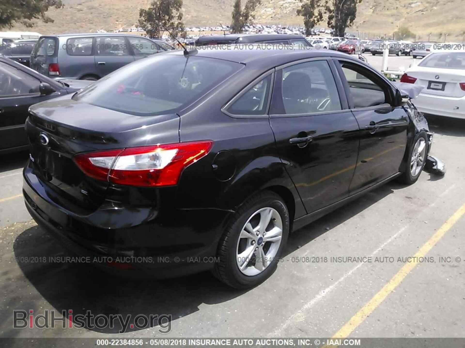 2014 Ford Focus - VIN: 1FADP3F21EL330443 - Фото 4