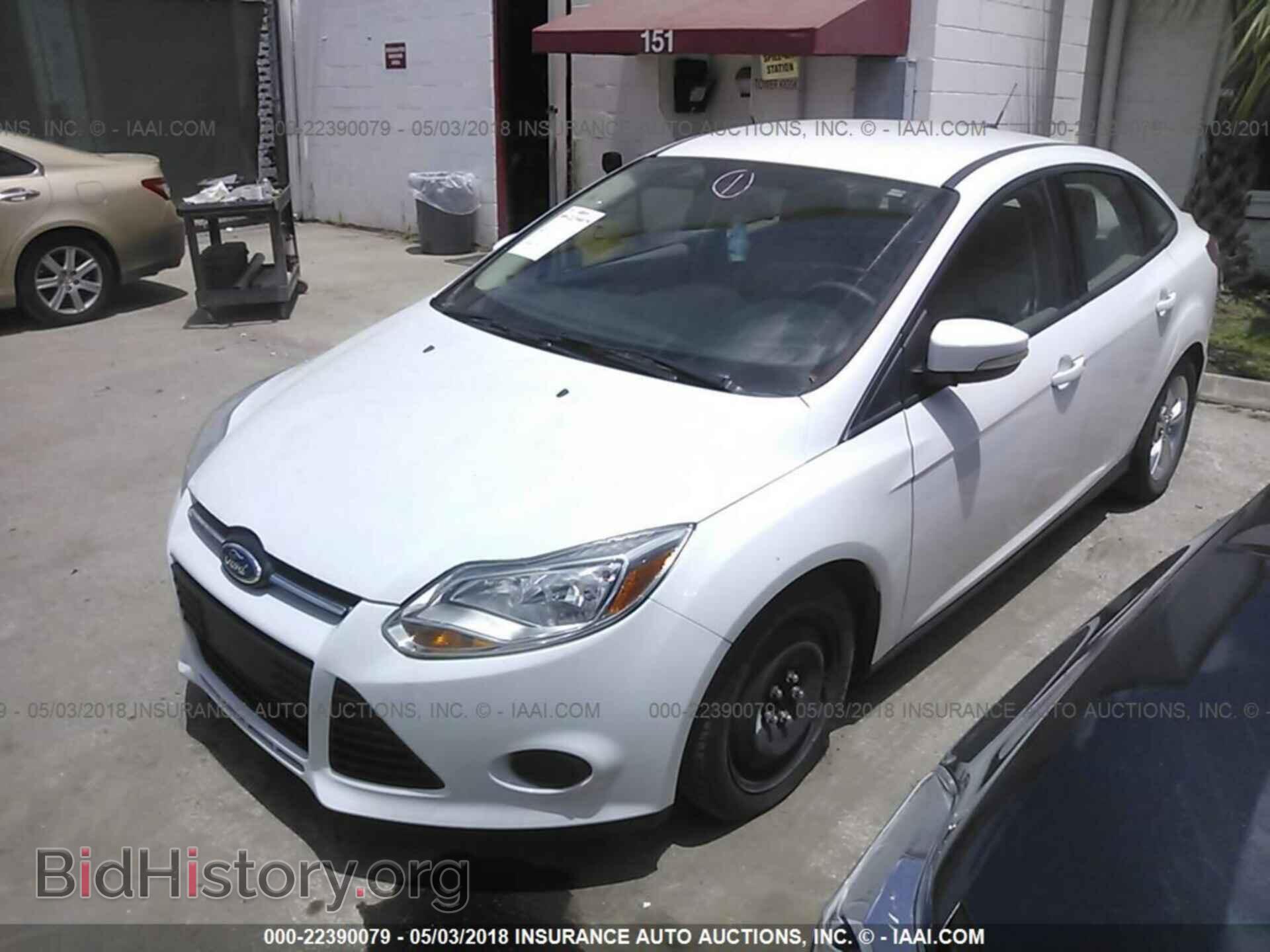 2014 Ford Focus - VIN: 1FADP3F23EL304703 - Photo 2