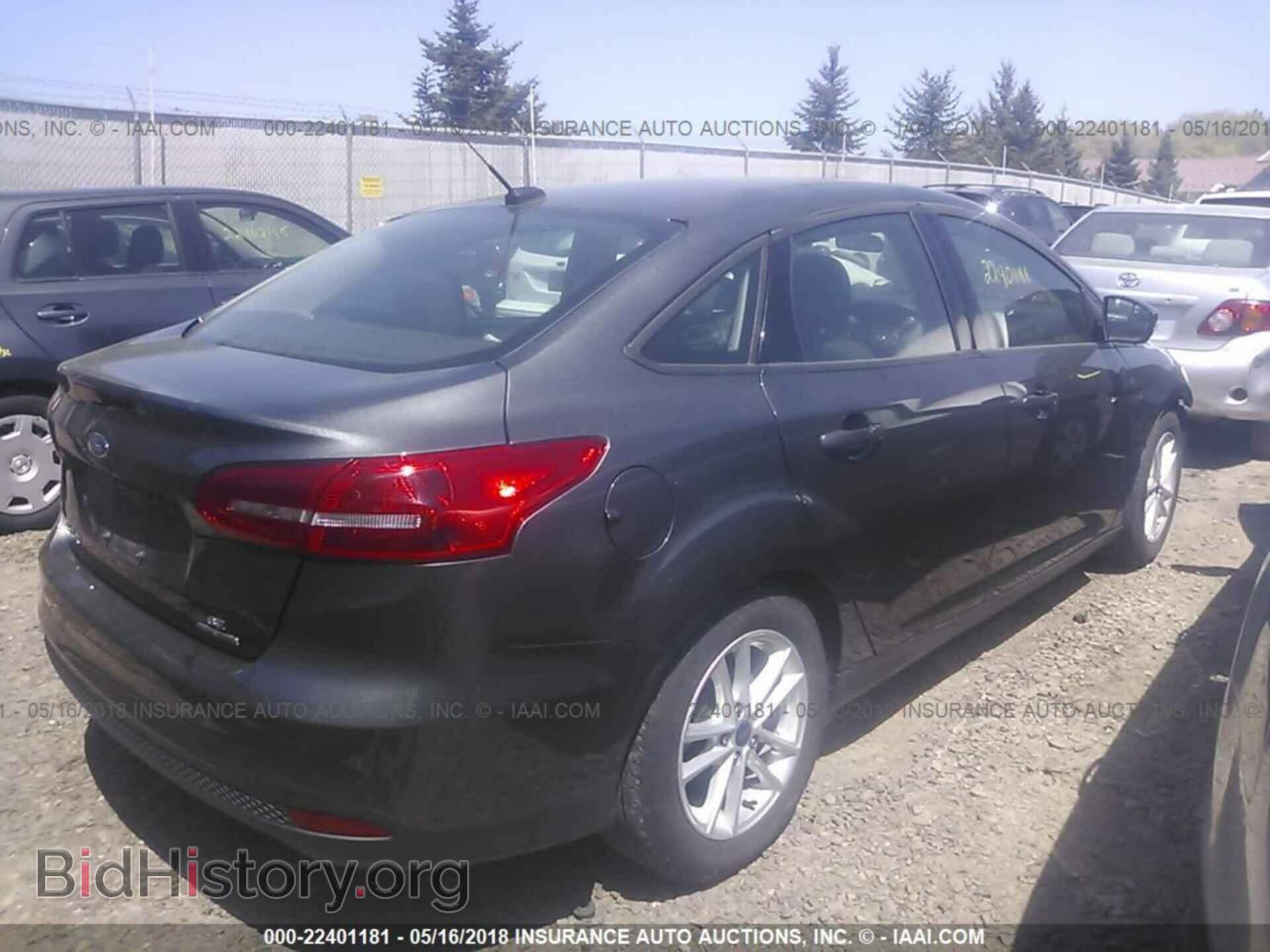 2016 Ford Focus - VIN: 1FADP3F29GL358073 - Photo 4