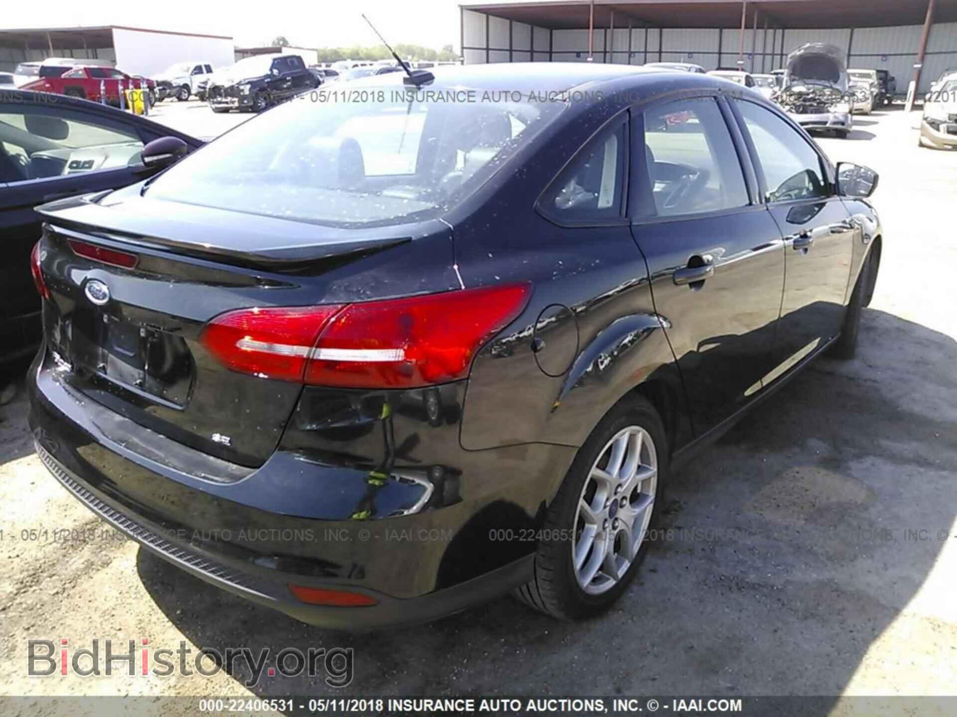 2015 Ford Focus - VIN: 1FADP3F27FL271254 - Photo 4