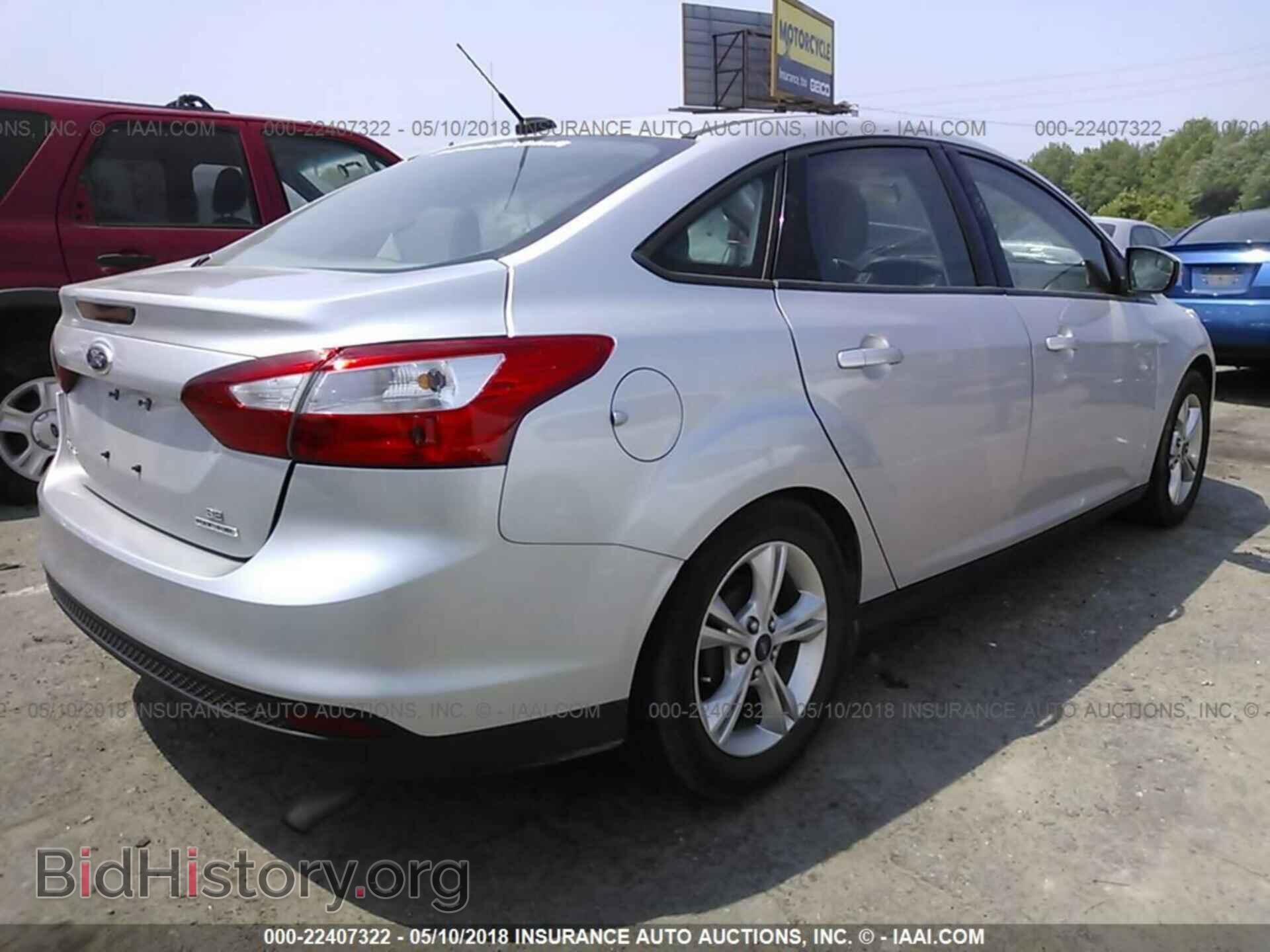 2014 Ford Focus - VIN: 1FADP3F21EL213056 - Фото 4