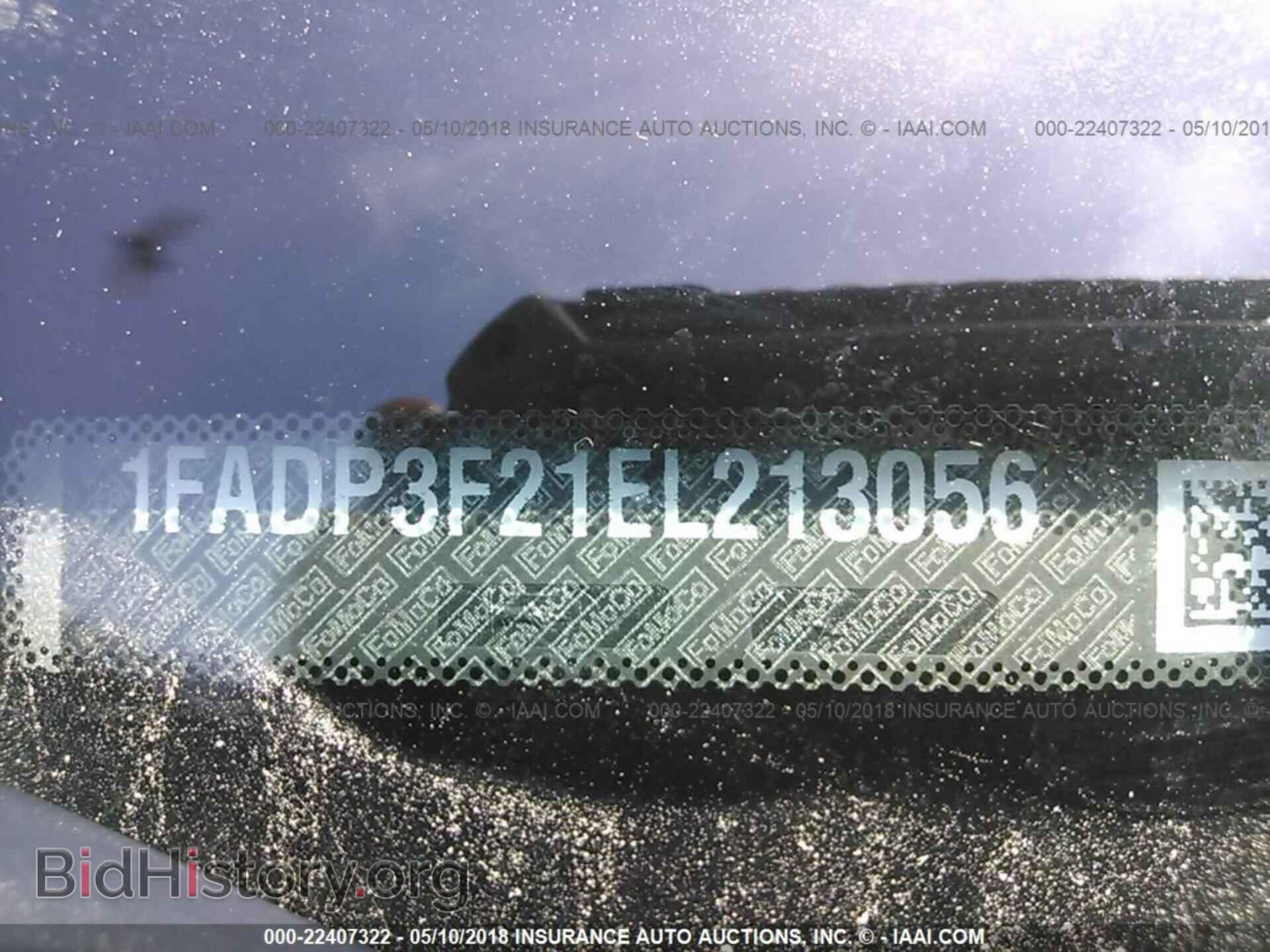 2014 Ford Focus - VIN: 1FADP3F21EL213056 - Фото 9