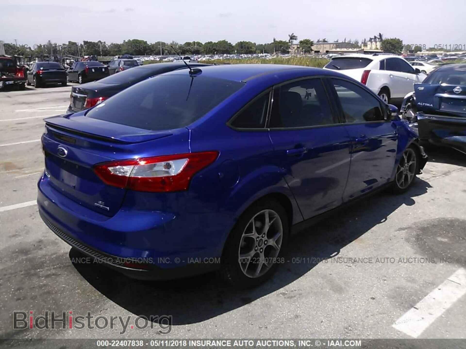 2014 Ford Focus - VIN: 1FADP3F21EL324805 - Photo 4
