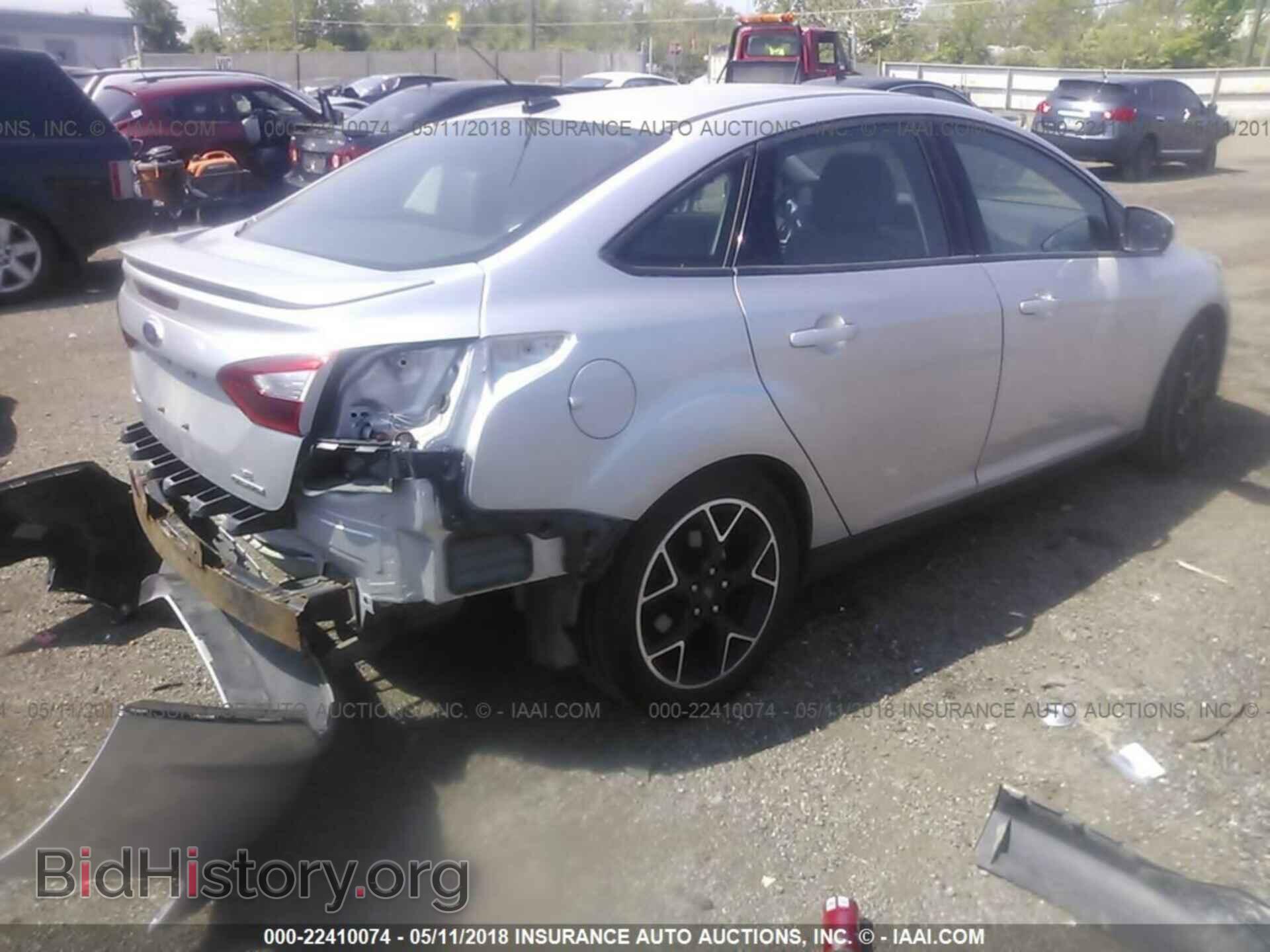2014 Ford Focus - VIN: 1FADP3F20EL193575 - Photo 4