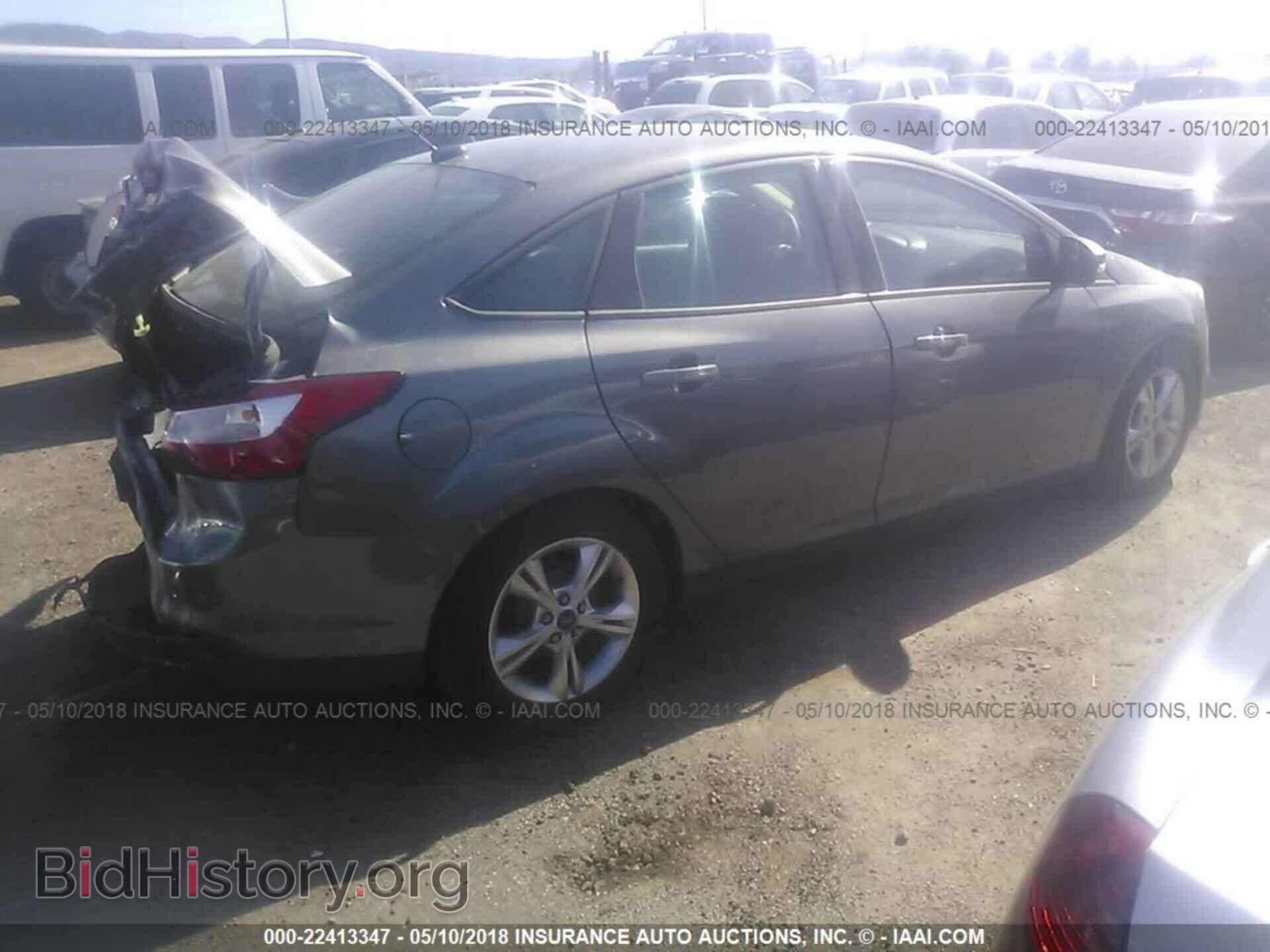 2014 Ford Focus - VIN: 1FADP3F26EL111137 - Фото 4