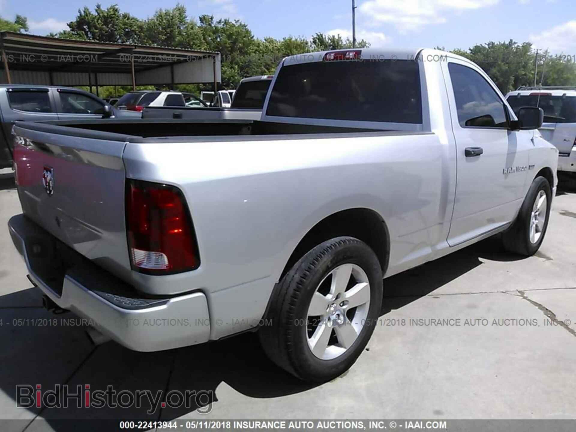 2012 Dodge Ram 1500 - VIN: 3C6JD6AT1CG124418 - Фото 4
