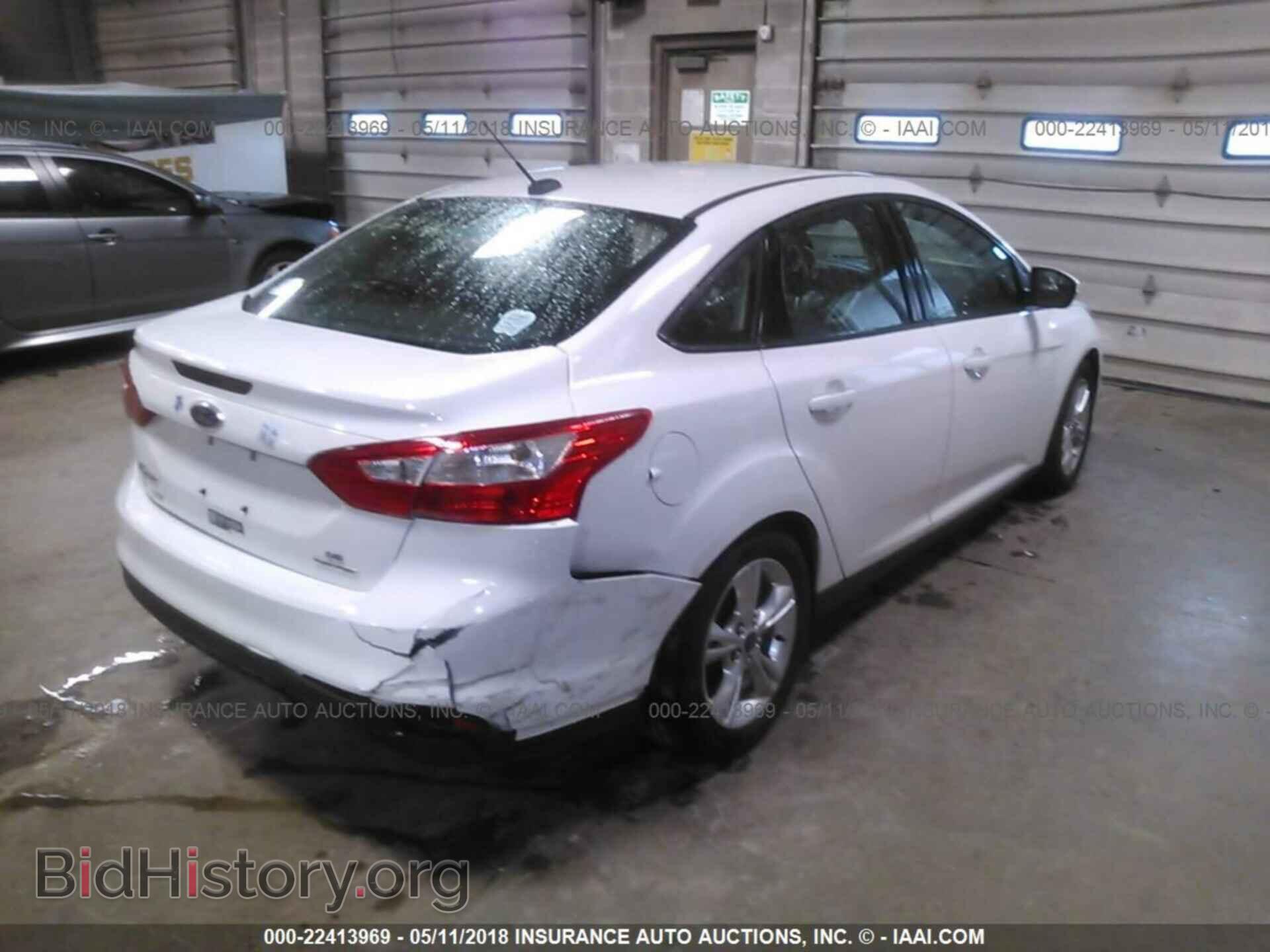 2014 Ford Focus - VIN: 1FADP3F25EL140032 - Фото 4