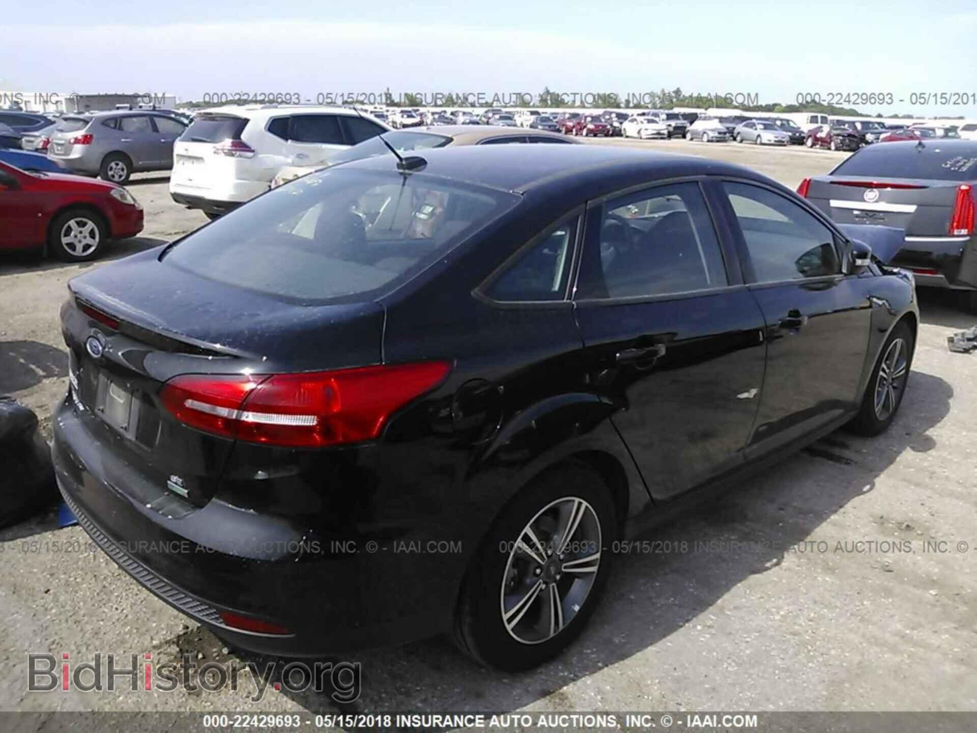 2017 Ford Focus - VIN: 1FADP3FE2HL309843 - Фото 4
