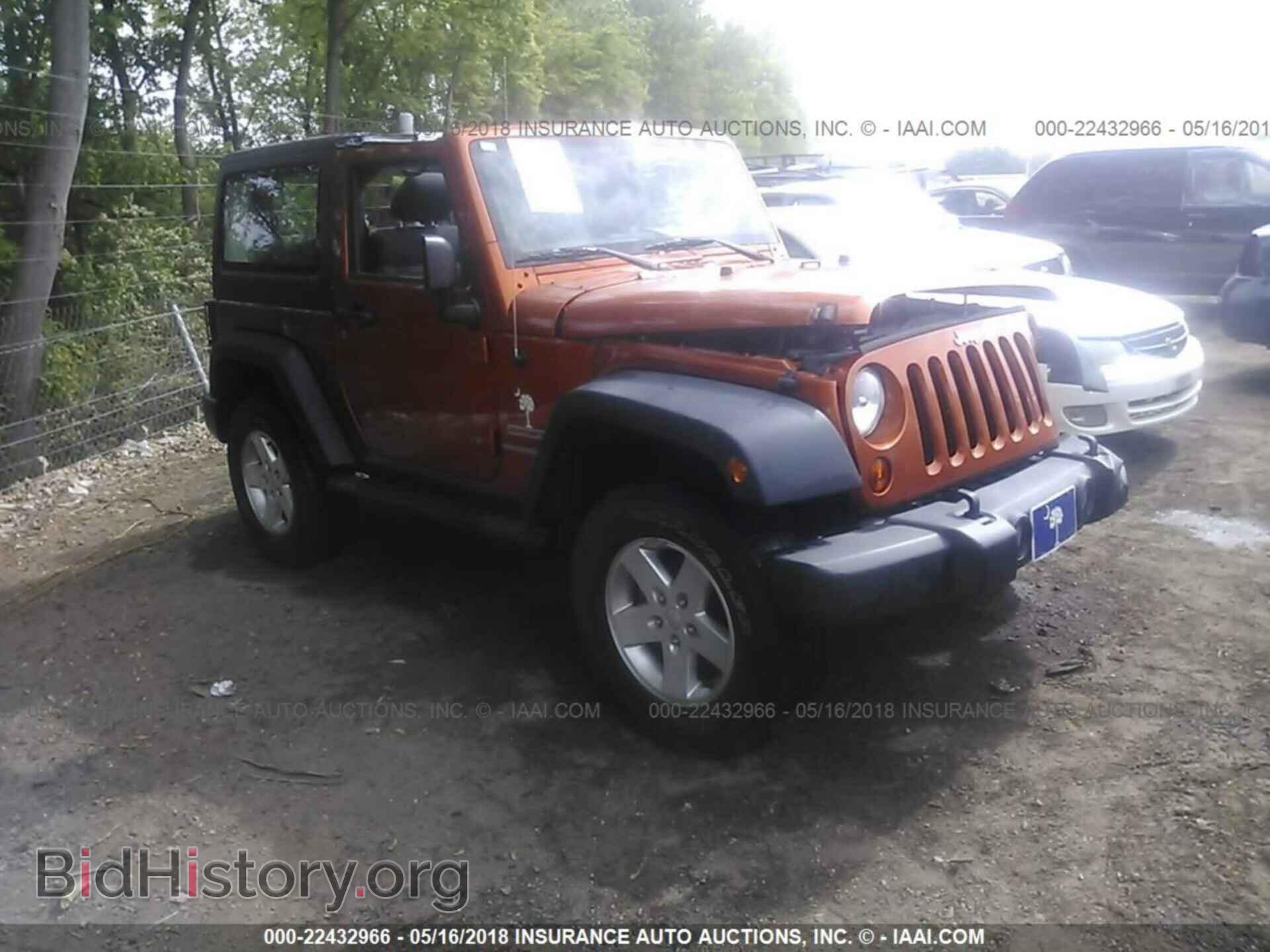 Фотография 1J4GA2D18BL574013 - Jeep Wrangler 2011