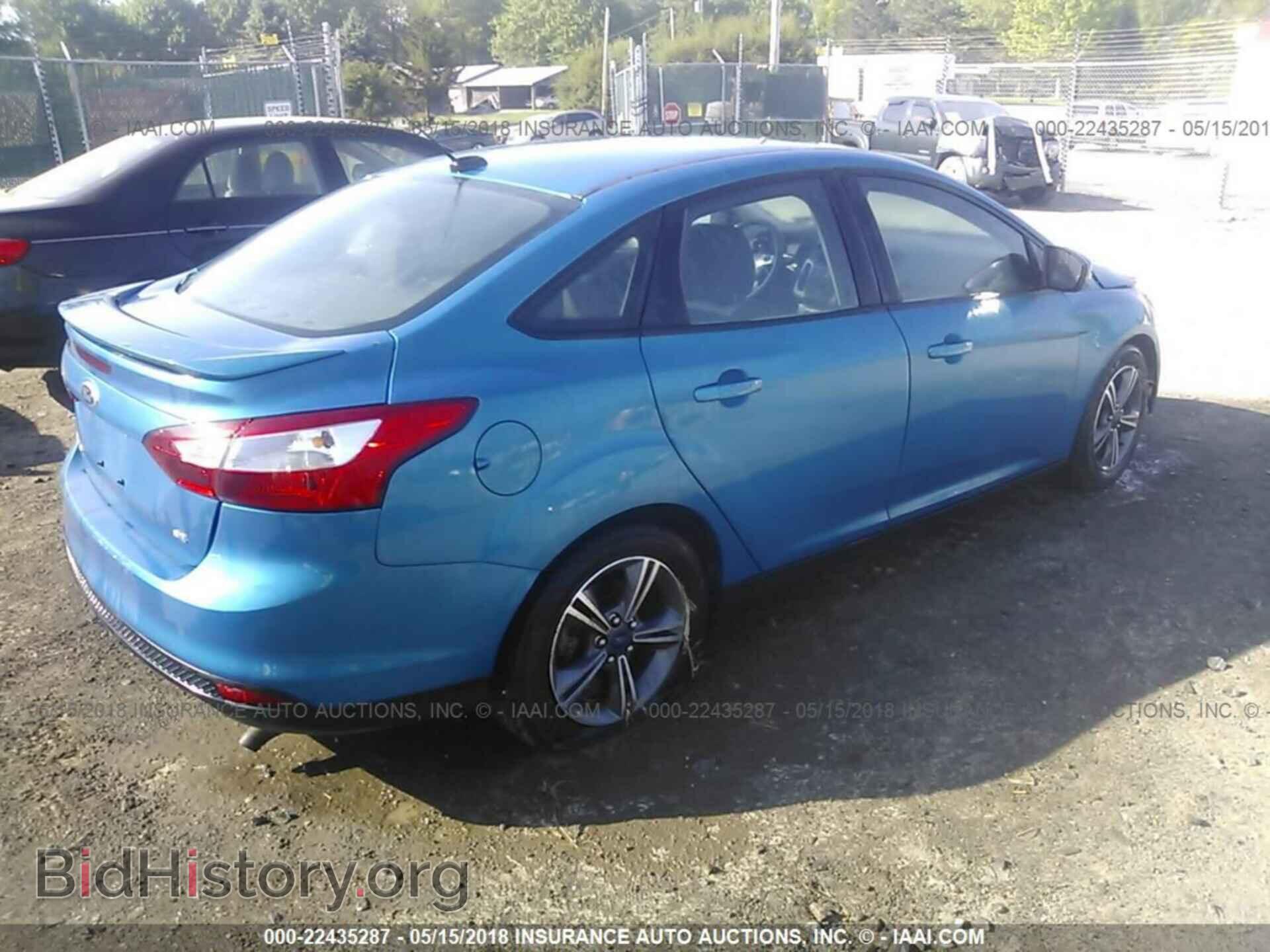 2014 Ford Focus - VIN: 1FADP3F23EL182604 - Фото 4
