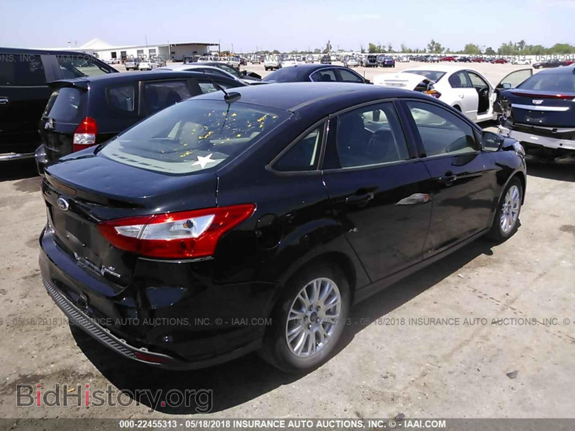 2012 Ford Focus - VIN: 1FAHP3F20CL458297 - Фото 4