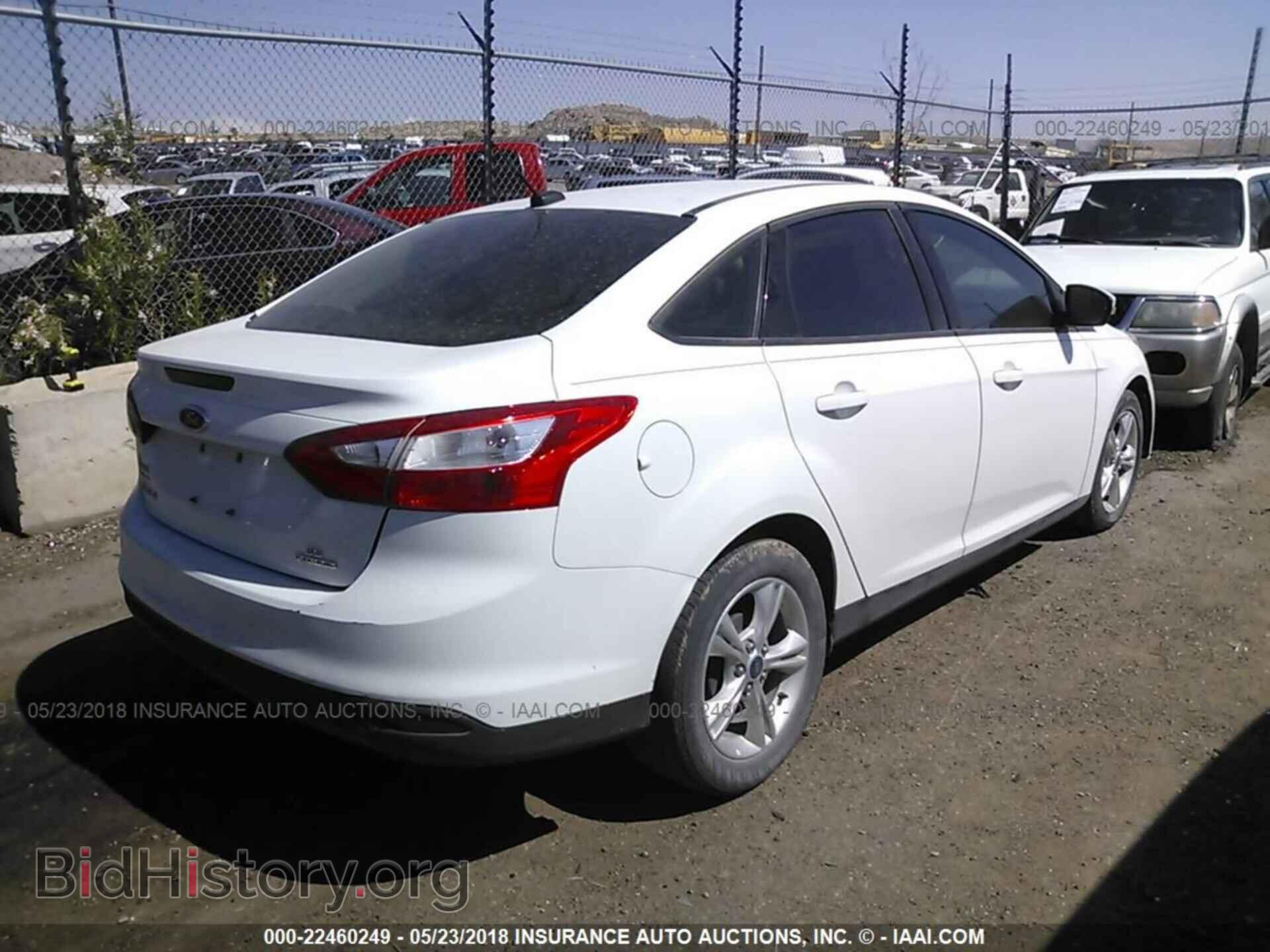 2014 Ford Focus - VIN: 1FADP3F20EL381223 - Фото 4