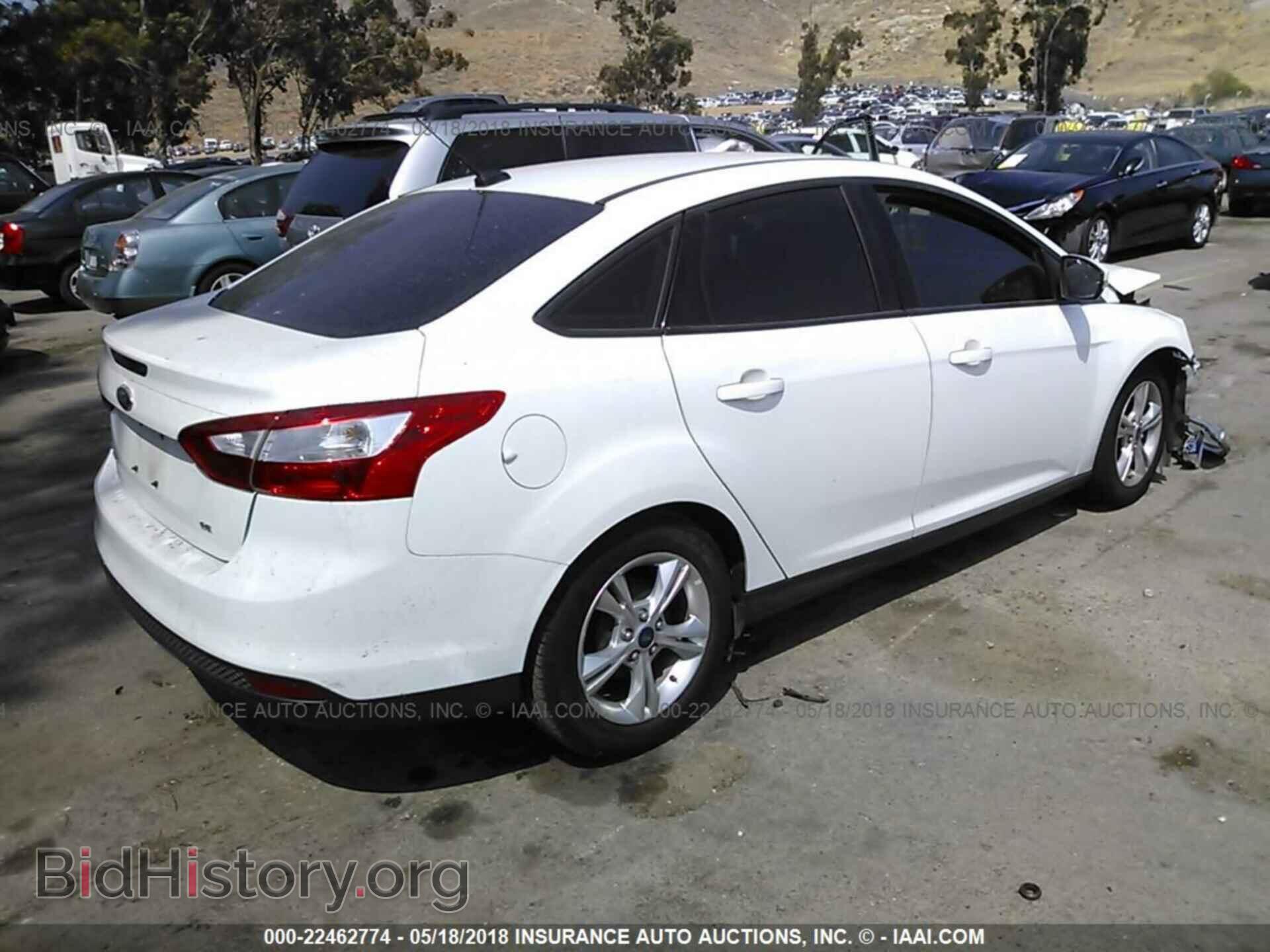 2014 Ford Focus - VIN: 1FADP3F24EL306430 - Фото 4