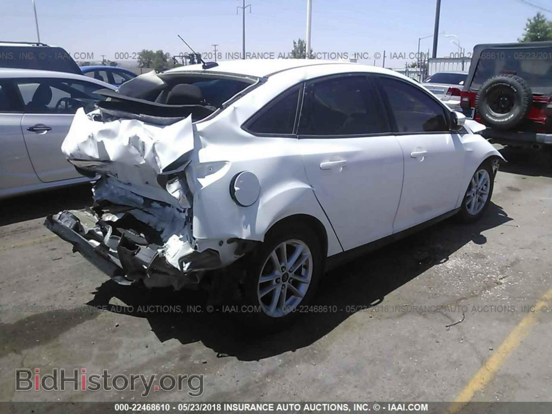 2015 Ford Focus - VIN: 1FADP3F28FL205554 - Фото 4