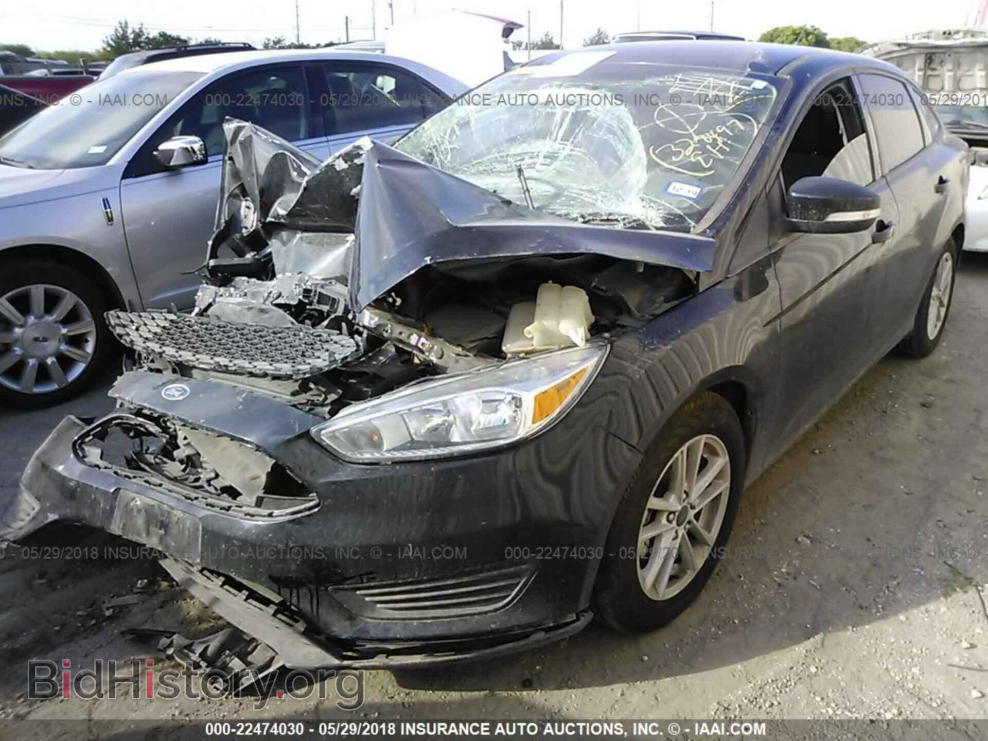 2017 Ford Focus - VIN: 1FADP3F21HL328597 - Photo 2