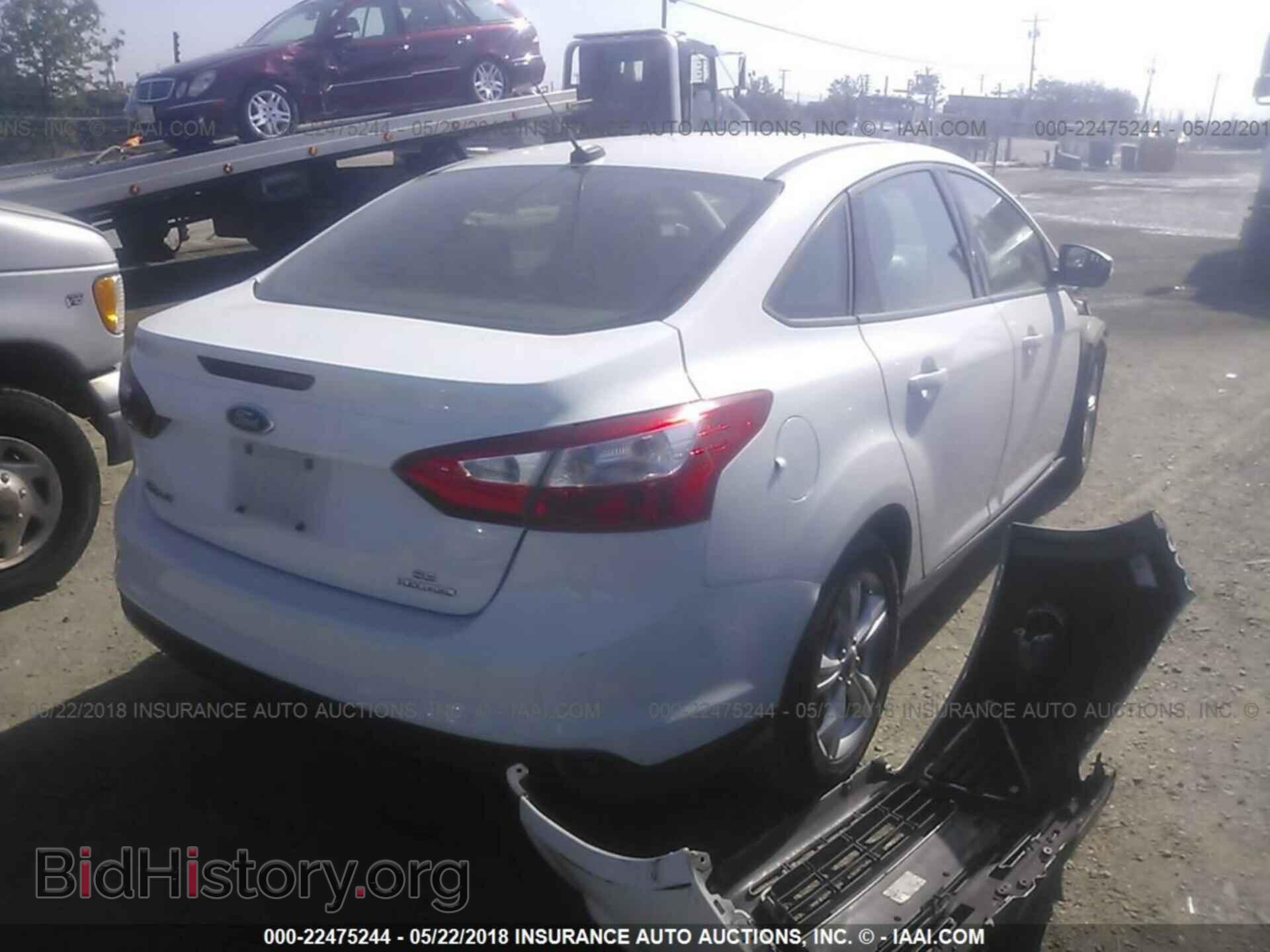 2013 Ford Focus - VIN: 1FADP3F25DL285957 - Photo 4