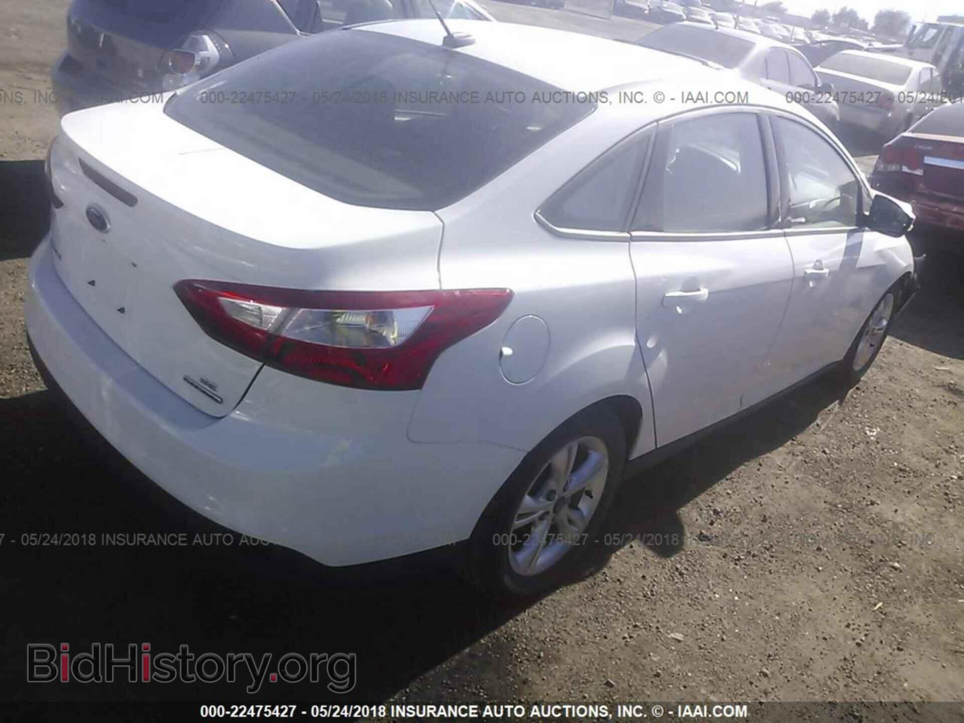 2014 Ford Focus - VIN: 1FADP3F25EL280856 - Photo 4