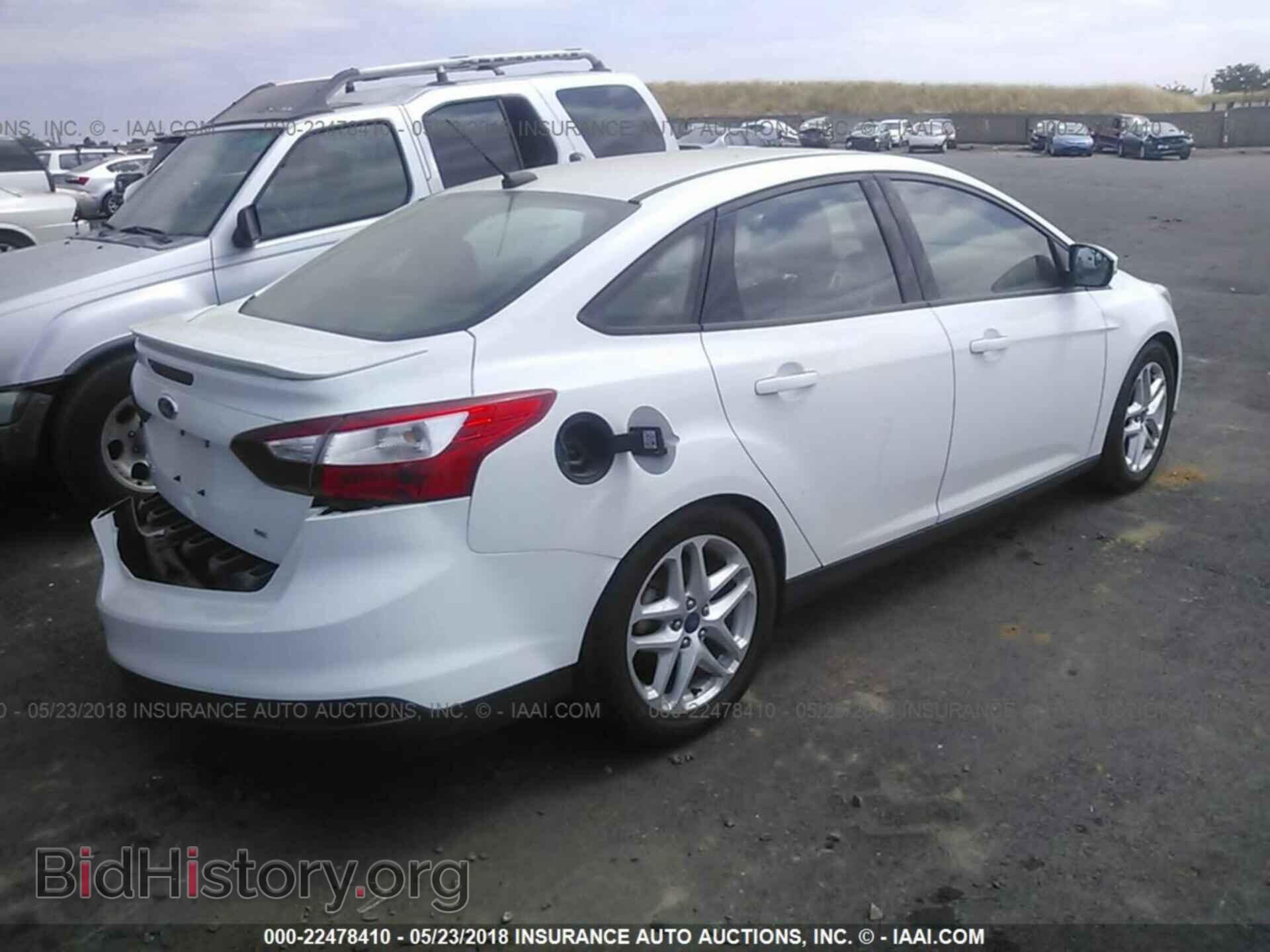 2014 Ford Focus - VIN: 1FADP3F25EL456014 - Photo 4