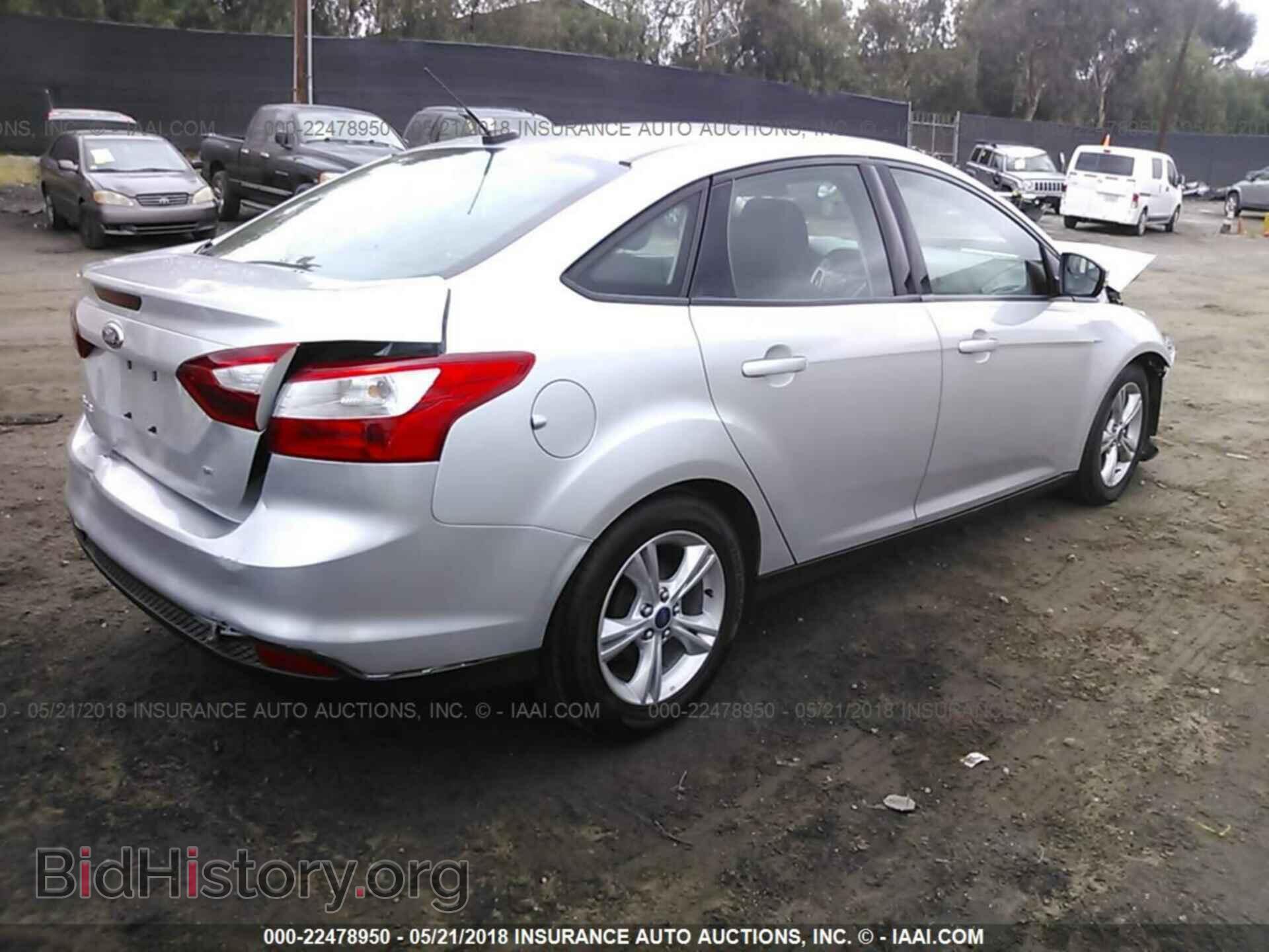 2014 Ford Focus - VIN: 1FADP3F23EL295498 - Фото 4