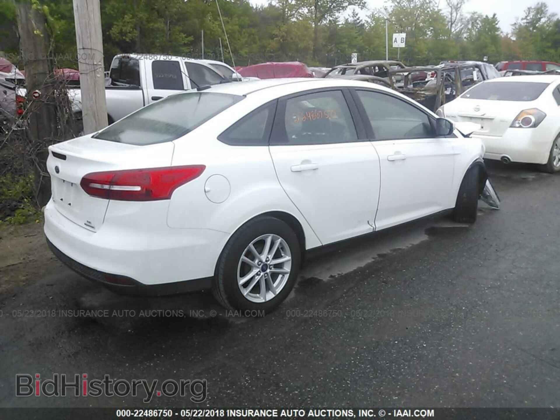 2015 Ford Focus - VIN: 1FADP3F20FL226530 - Photo 4