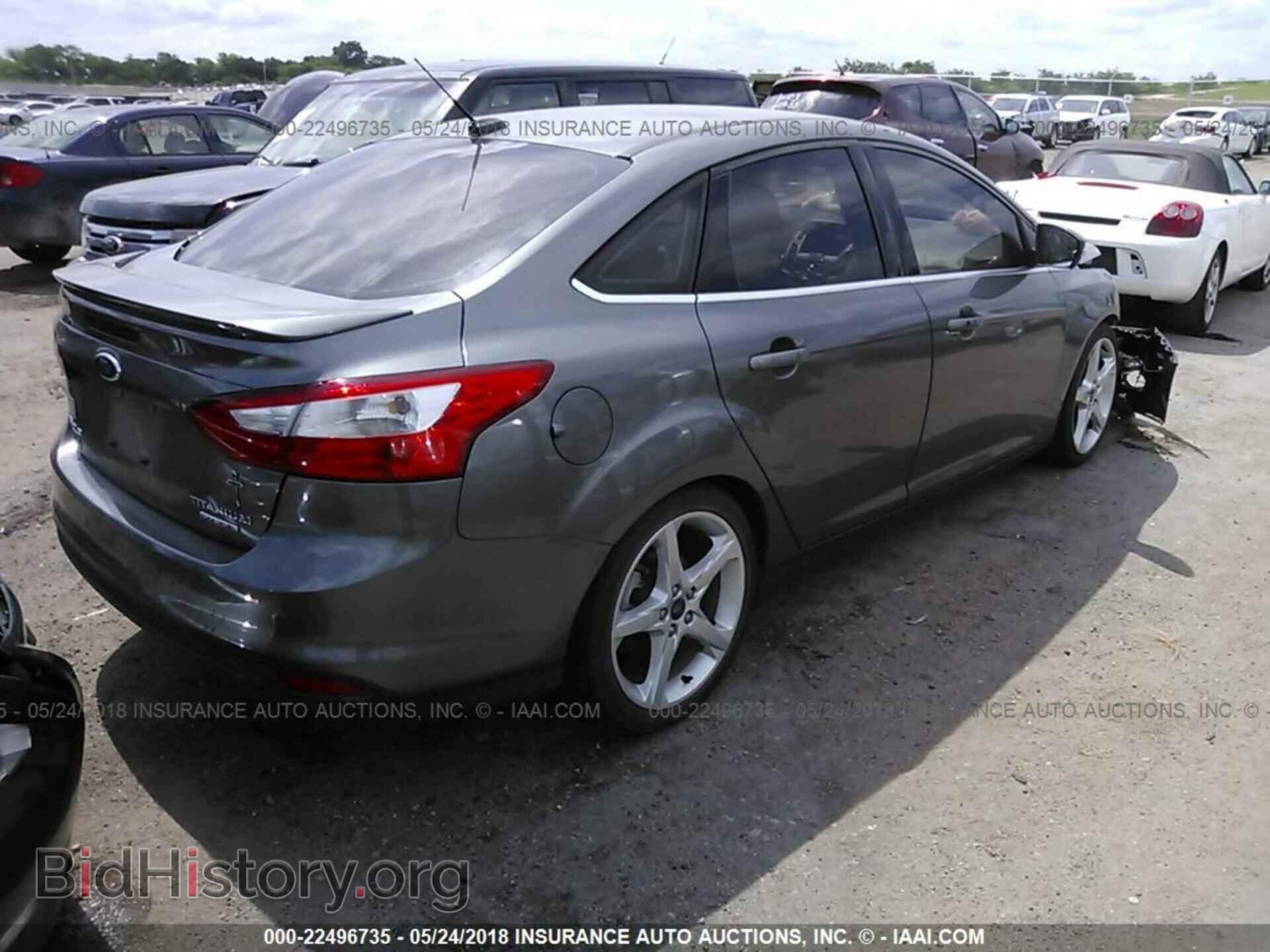 2014 Ford Focus - VIN: 1FADP3J2XEL115330 - Photo 4